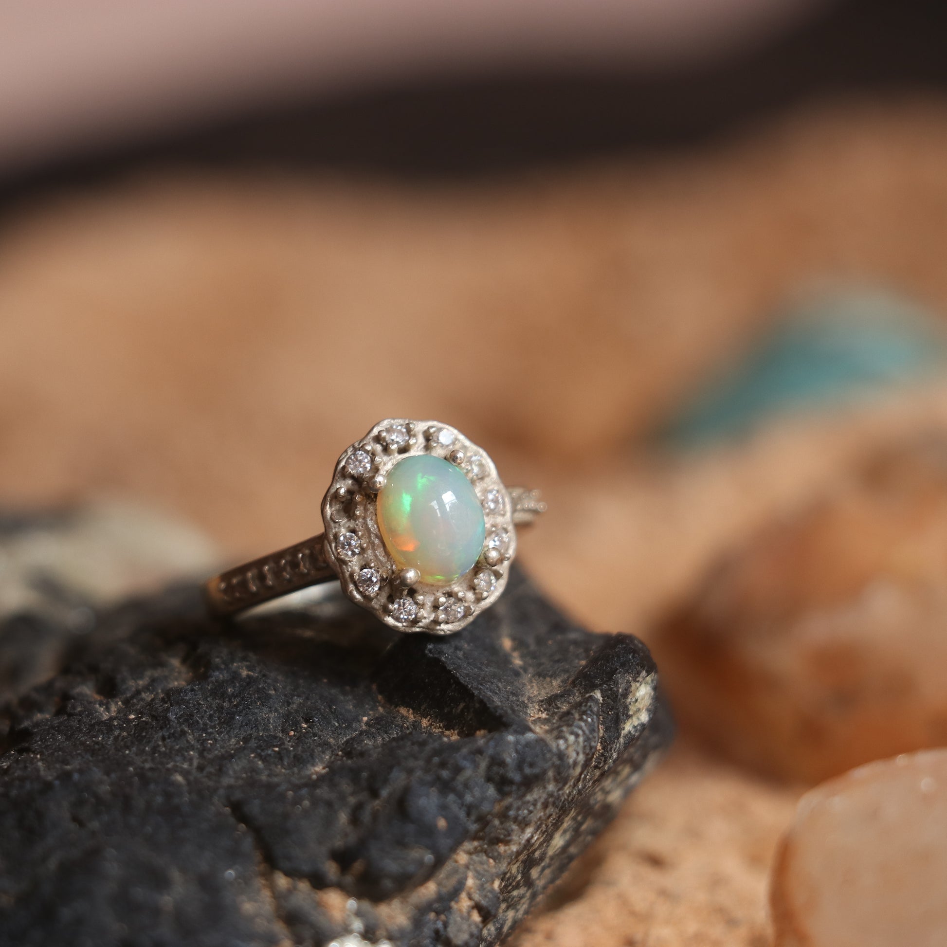SILVER RING STUDDED WITH ZIRCON AND NATURAL ETHIOPIAN OPAL