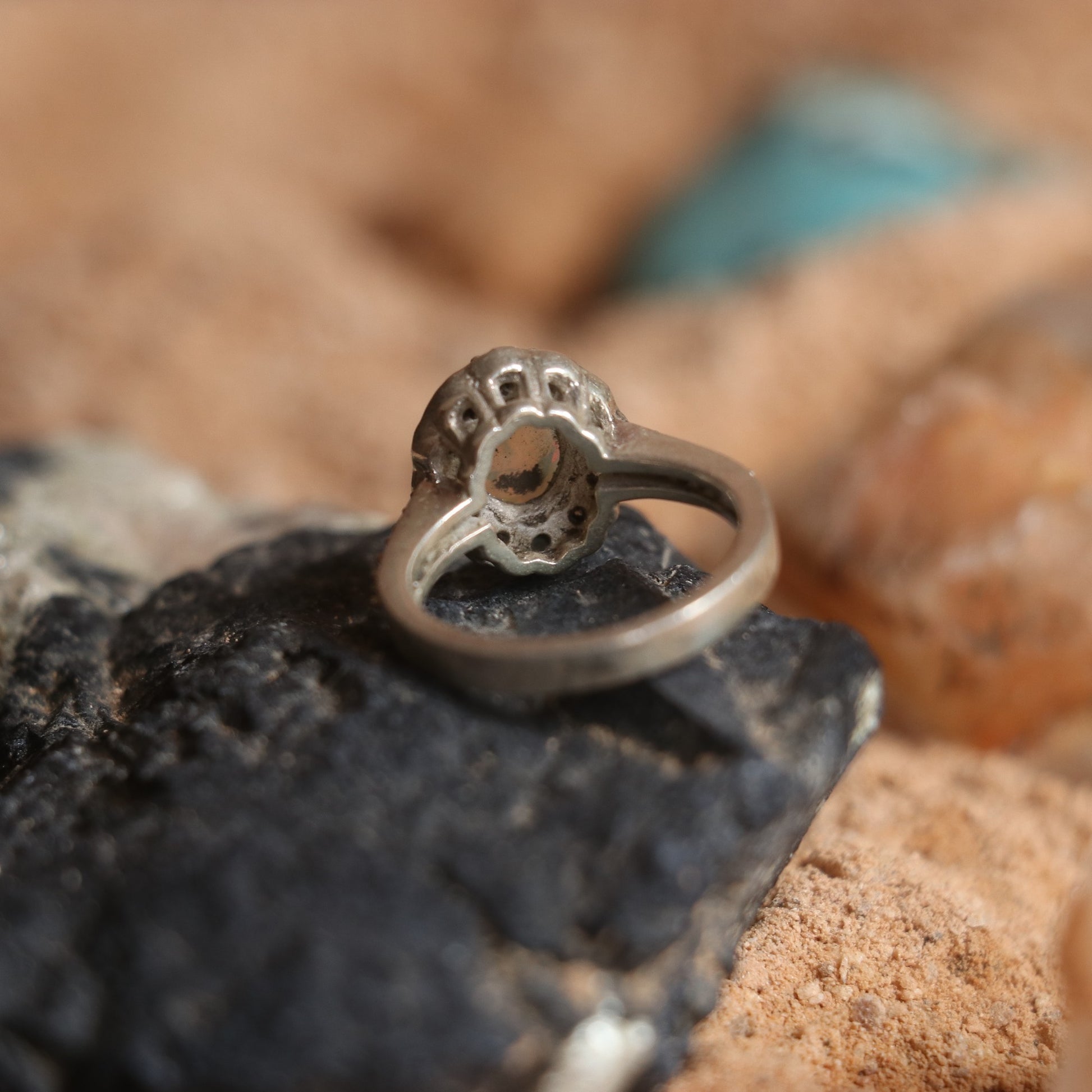 SILVER RING STUDDED WITH ZIRCON AND NATURAL ETHIOPIAN OPAL