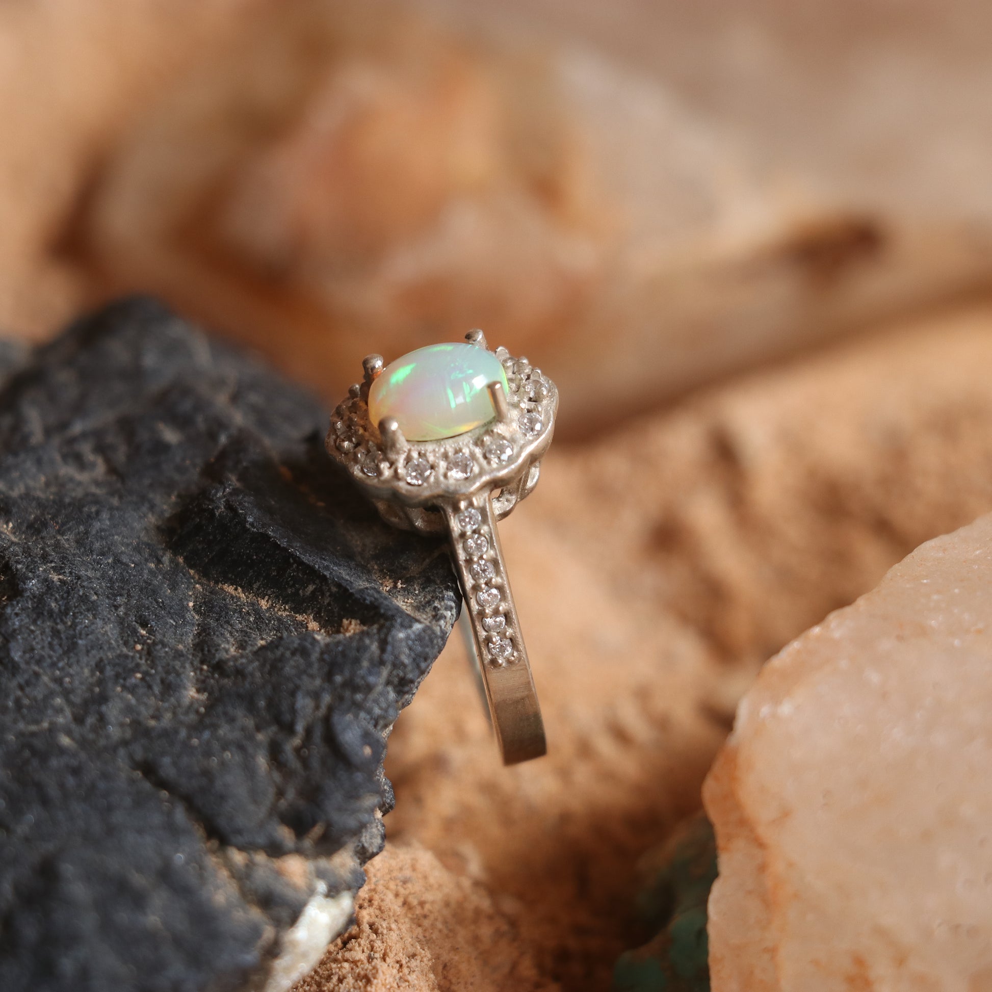 SILVER RING STUDDED WITH ZIRCON AND NATURAL ETHIOPIAN OPAL