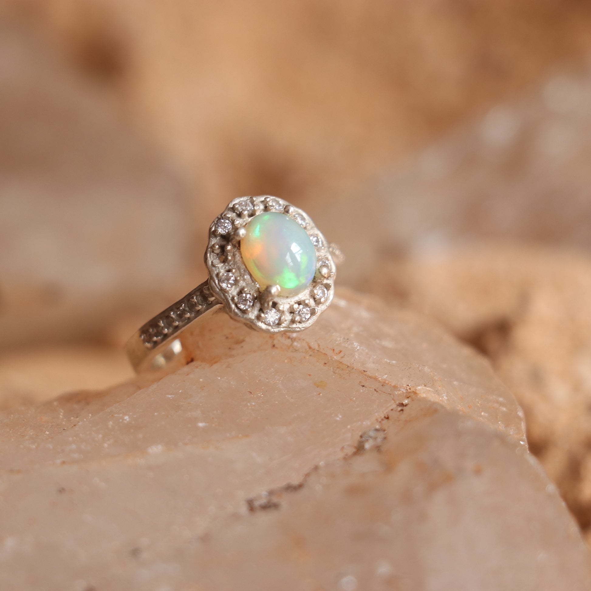 SILVER RING STUDDED WITH ZIRCON AND NATURAL ETHIOPIAN OPAL