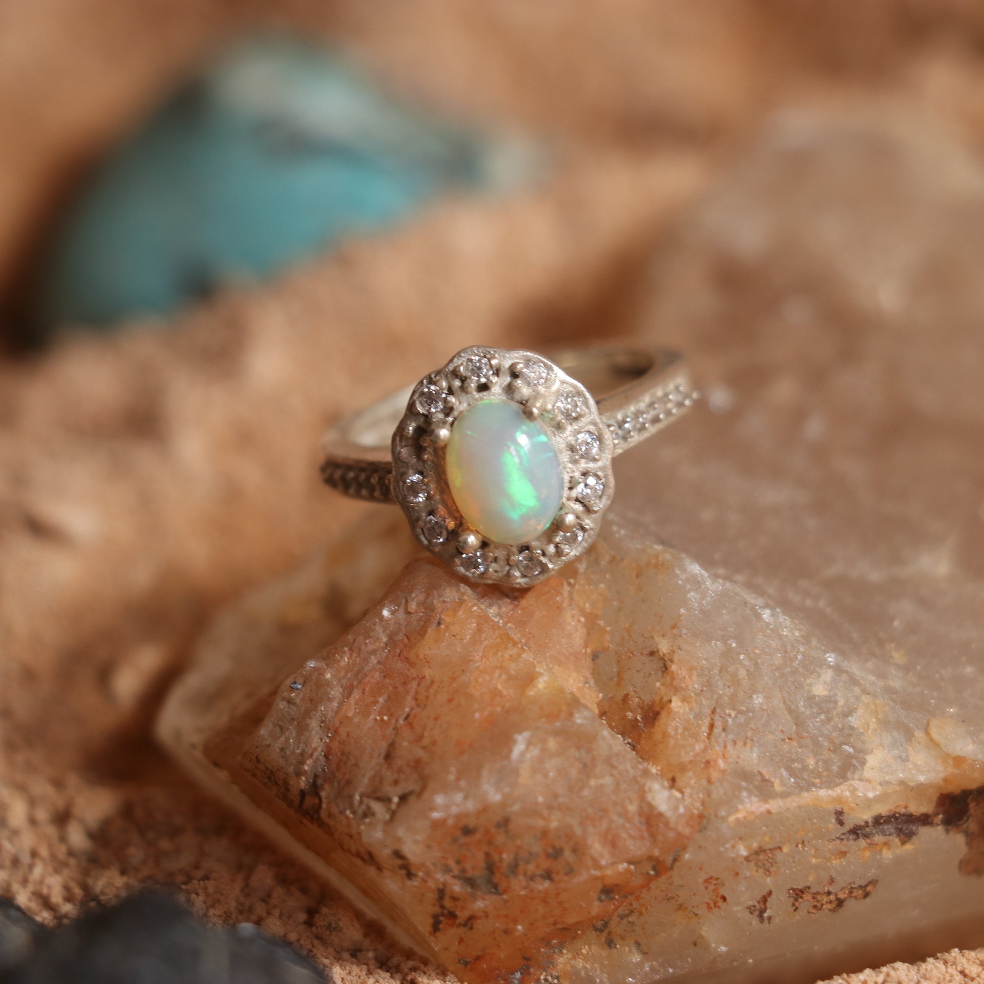 SILVER RING STUDDED WITH ZIRCON AND NATURAL ETHIOPIAN OPAL