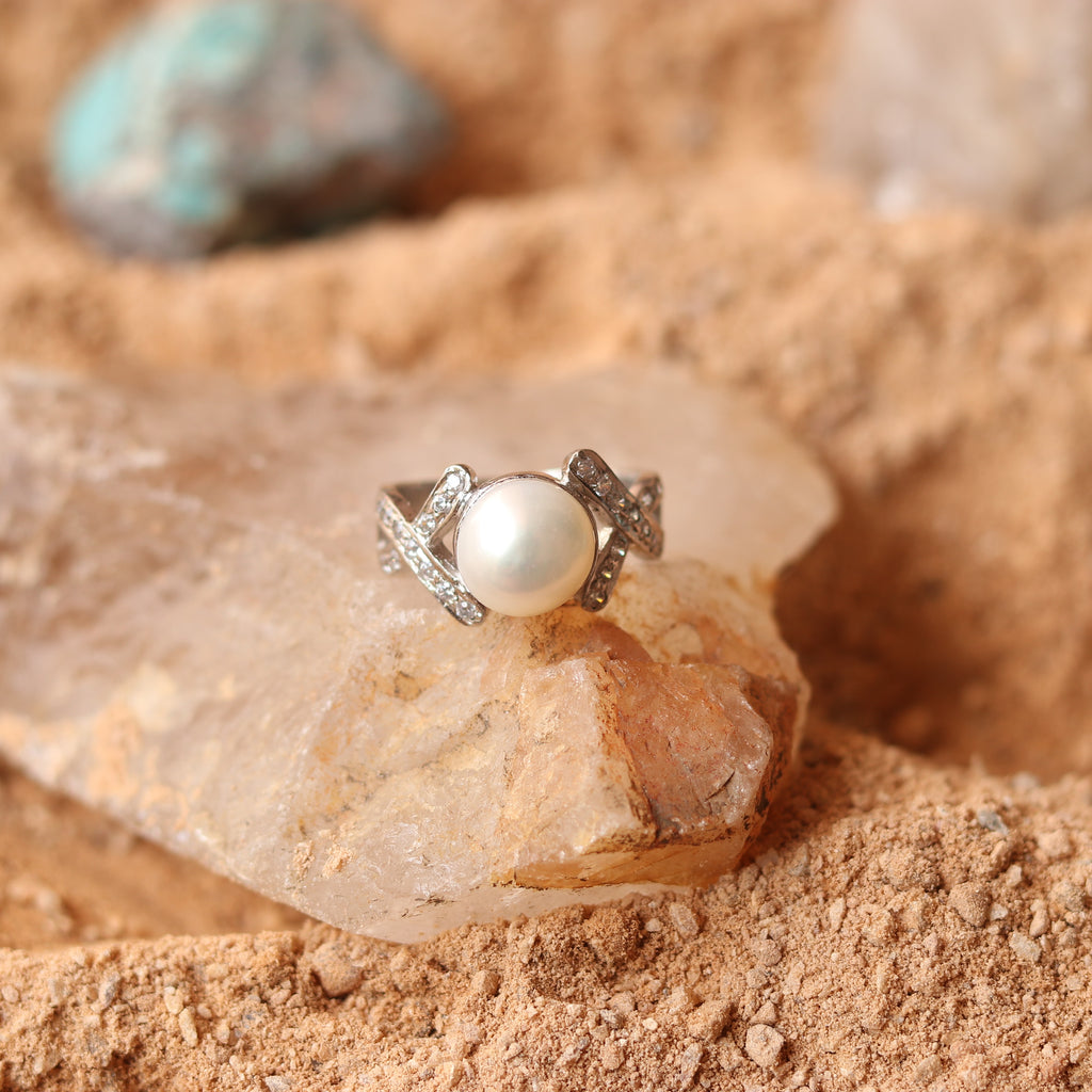 SILVER RING STUDDED WITH ZIRCON AND NATURAL PEARL
