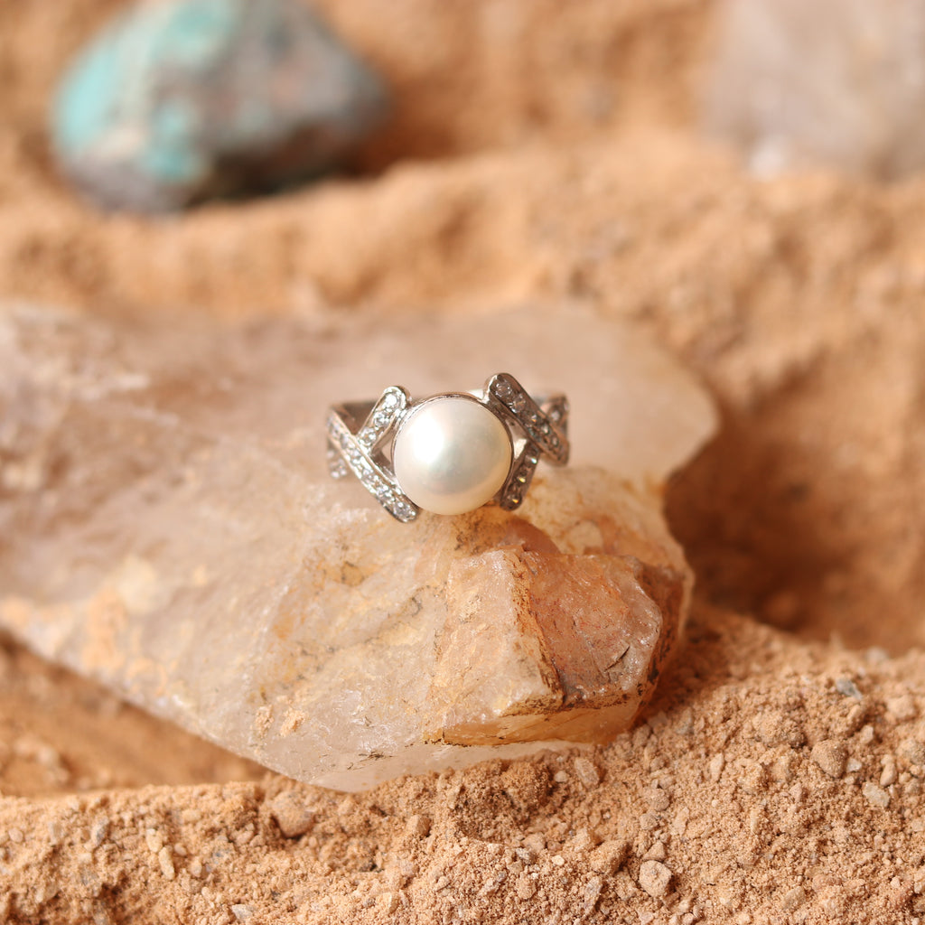 SILVER RING STUDDED WITH ZIRCON AND NATURAL PEARL