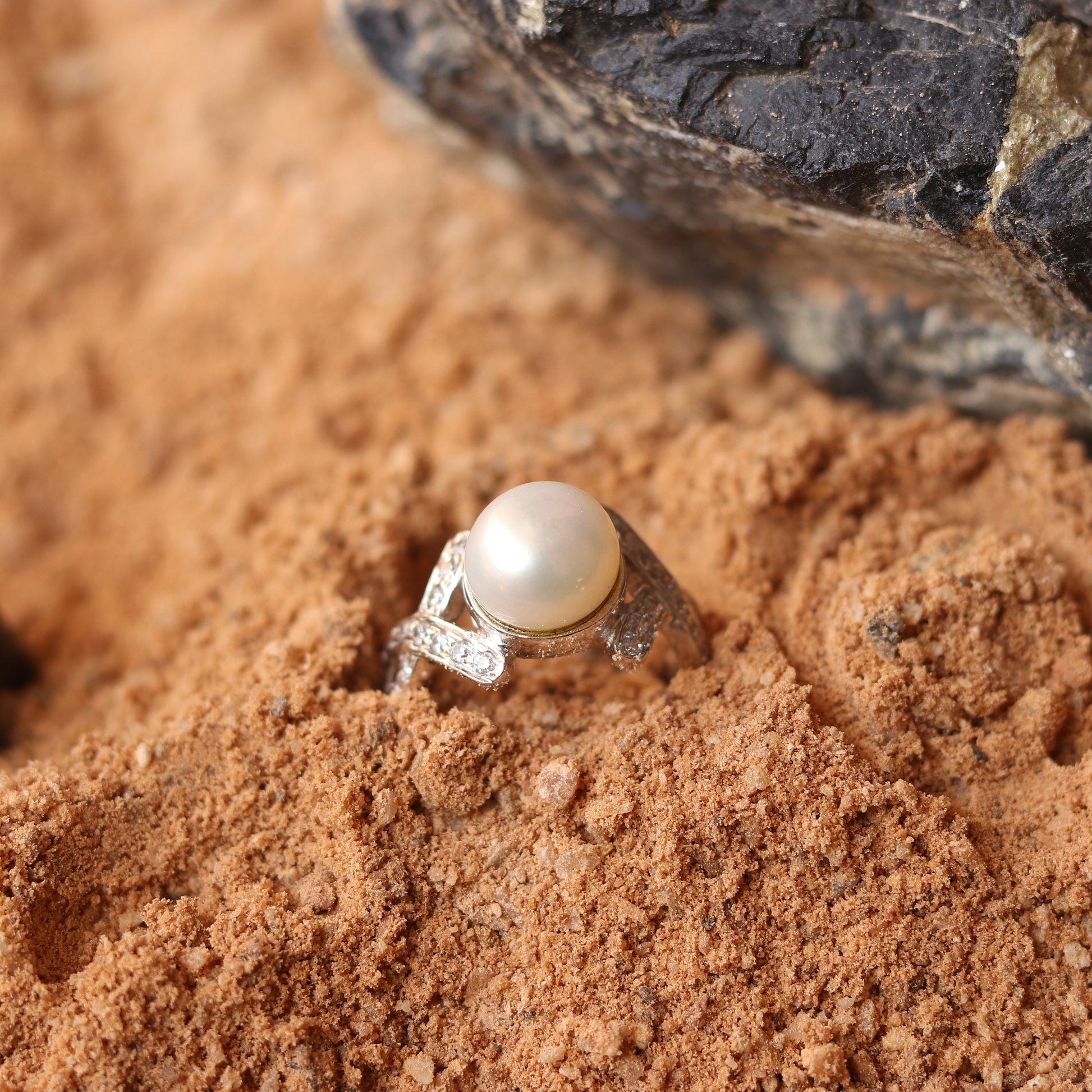 SILVER RING STUDDED WITH ZIRCON AND NATURAL PEARL