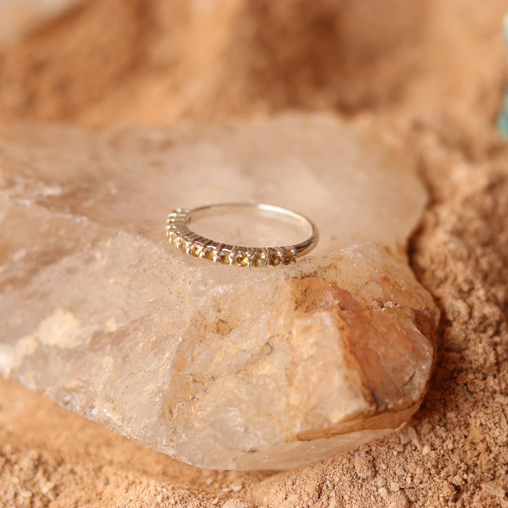 SILVER BAND STUDDED WITH YELLOW TOPAZ