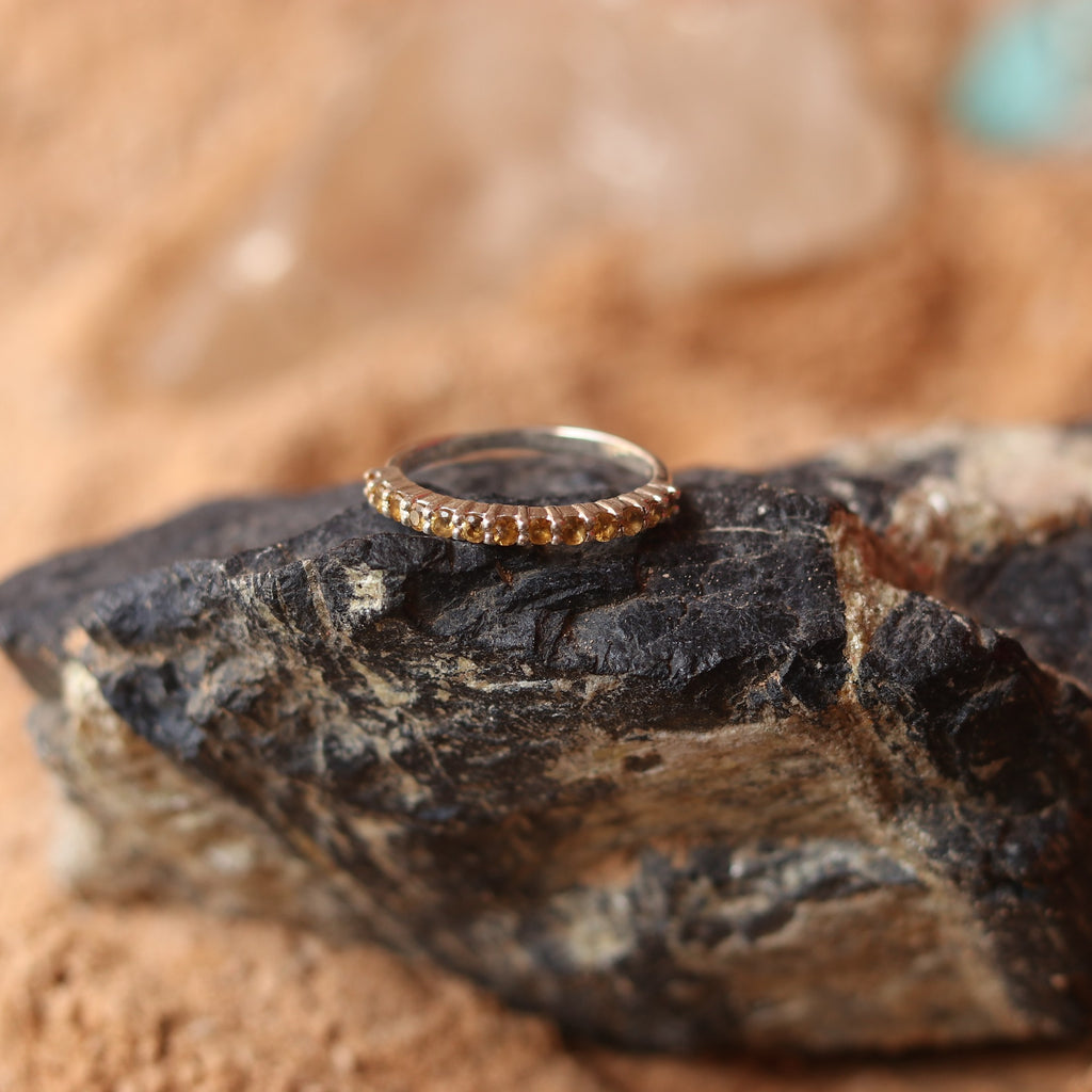 SILVER BAND STUDDED WITH YELLOW TOPAZ
