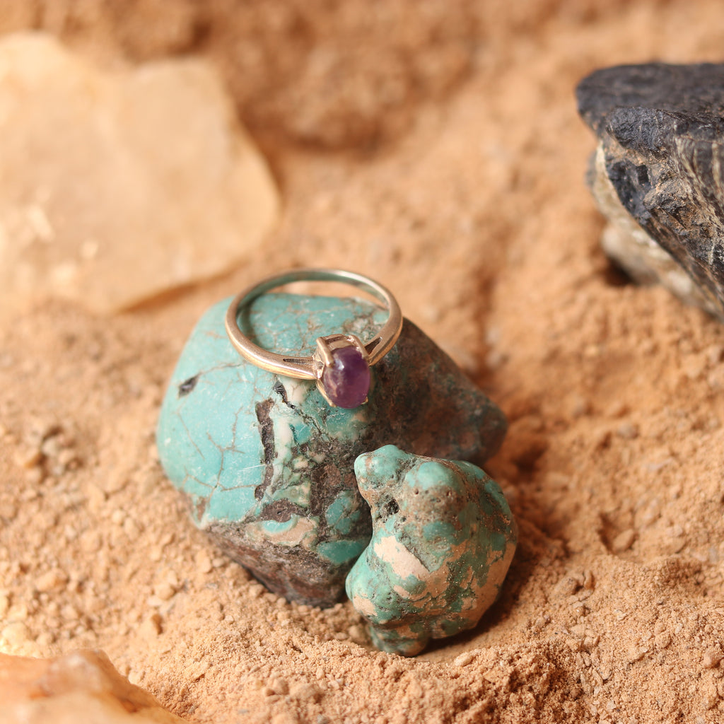SILVER RING STUDDED WITH AMETHYST
