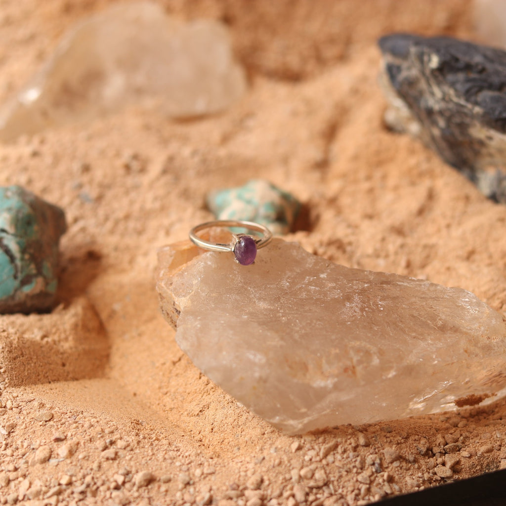 SILVER RING STUDDED WITH AMETHYST