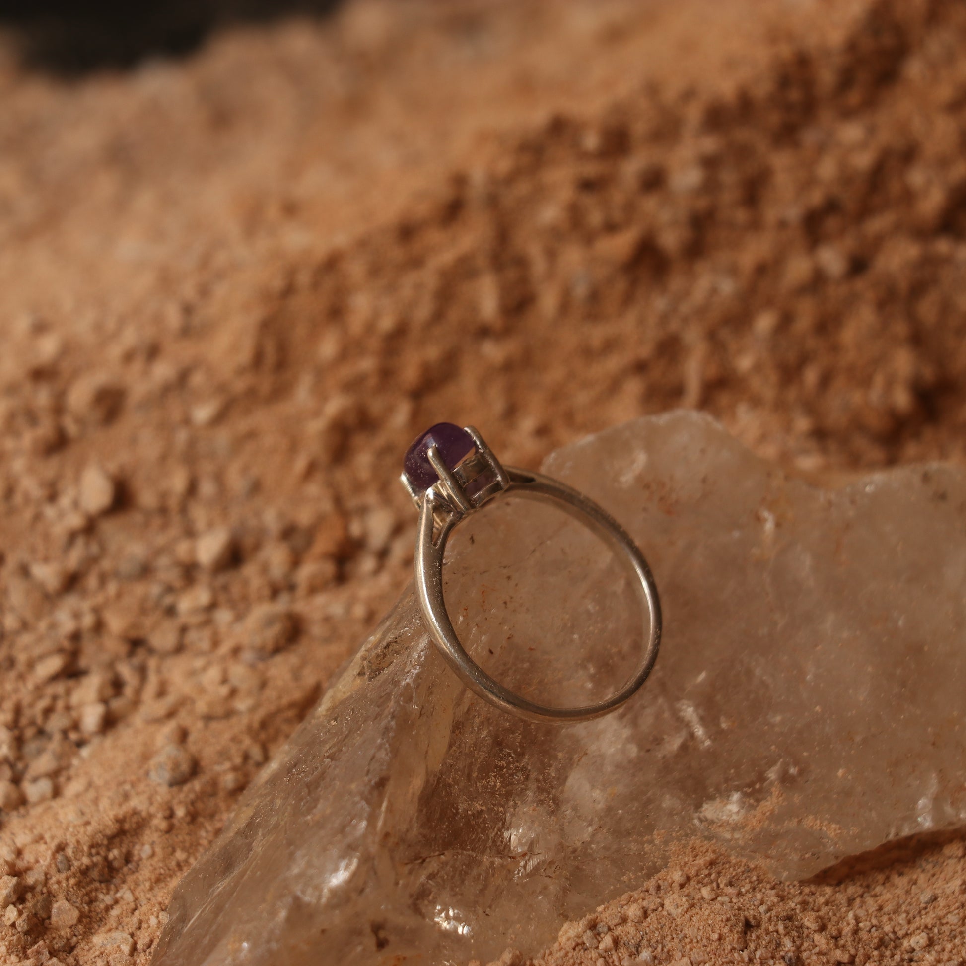 SILVER RING STUDDED WITH AMETHYST