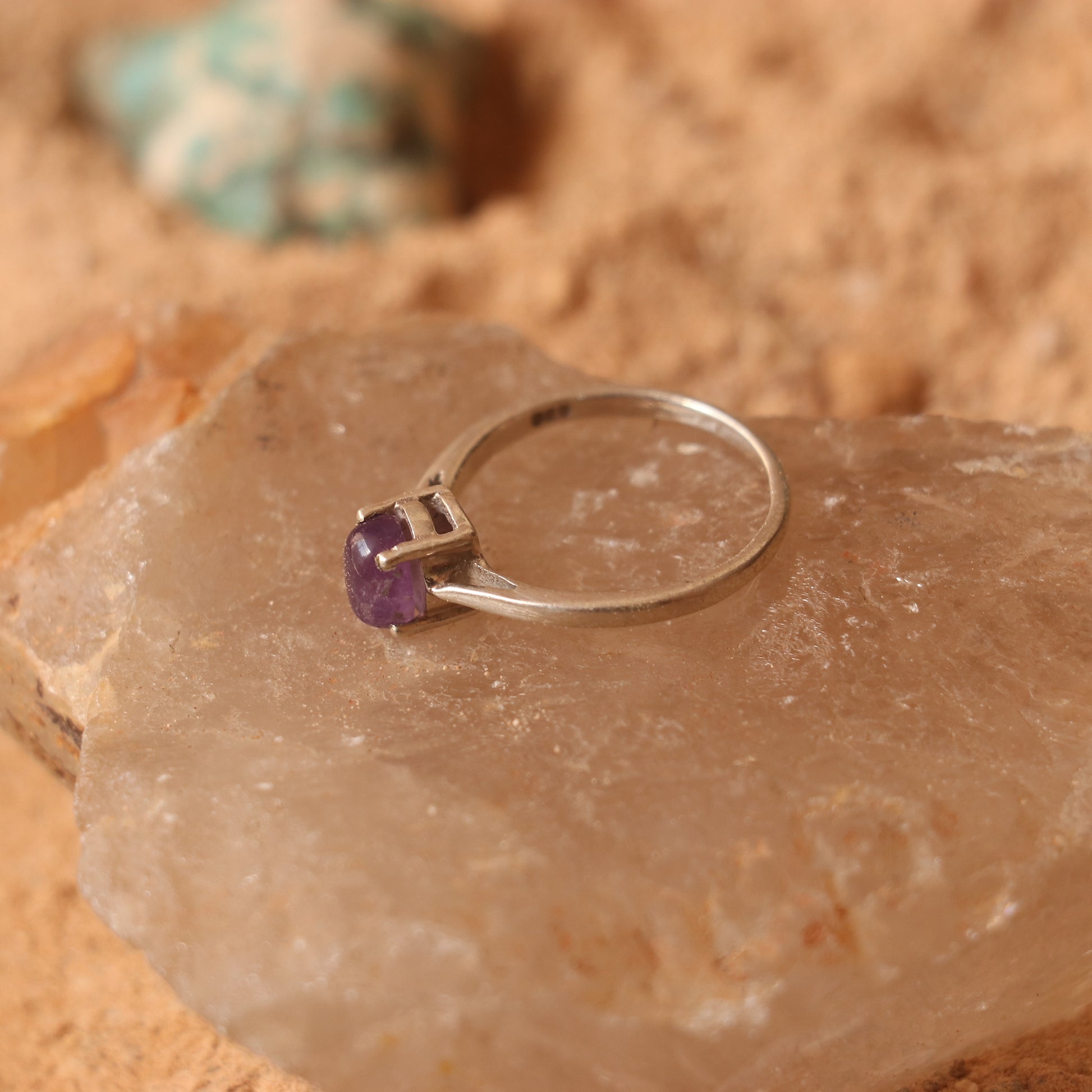 SILVER RING STUDDED WITH AMETHYST