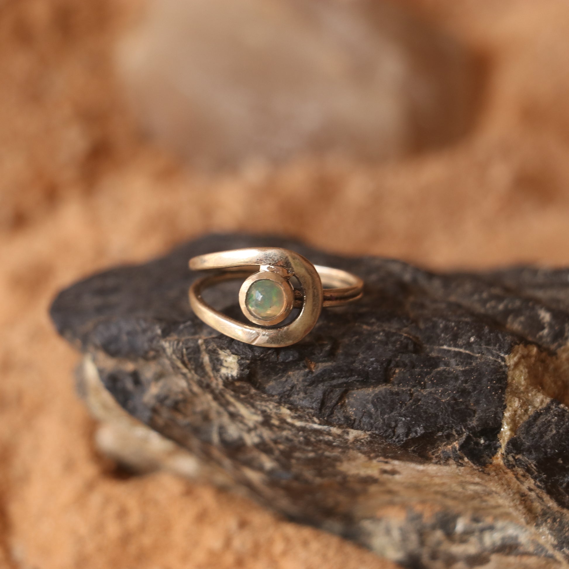 SILVER RING STUDDED WITH ETHIOPIAN OPAL