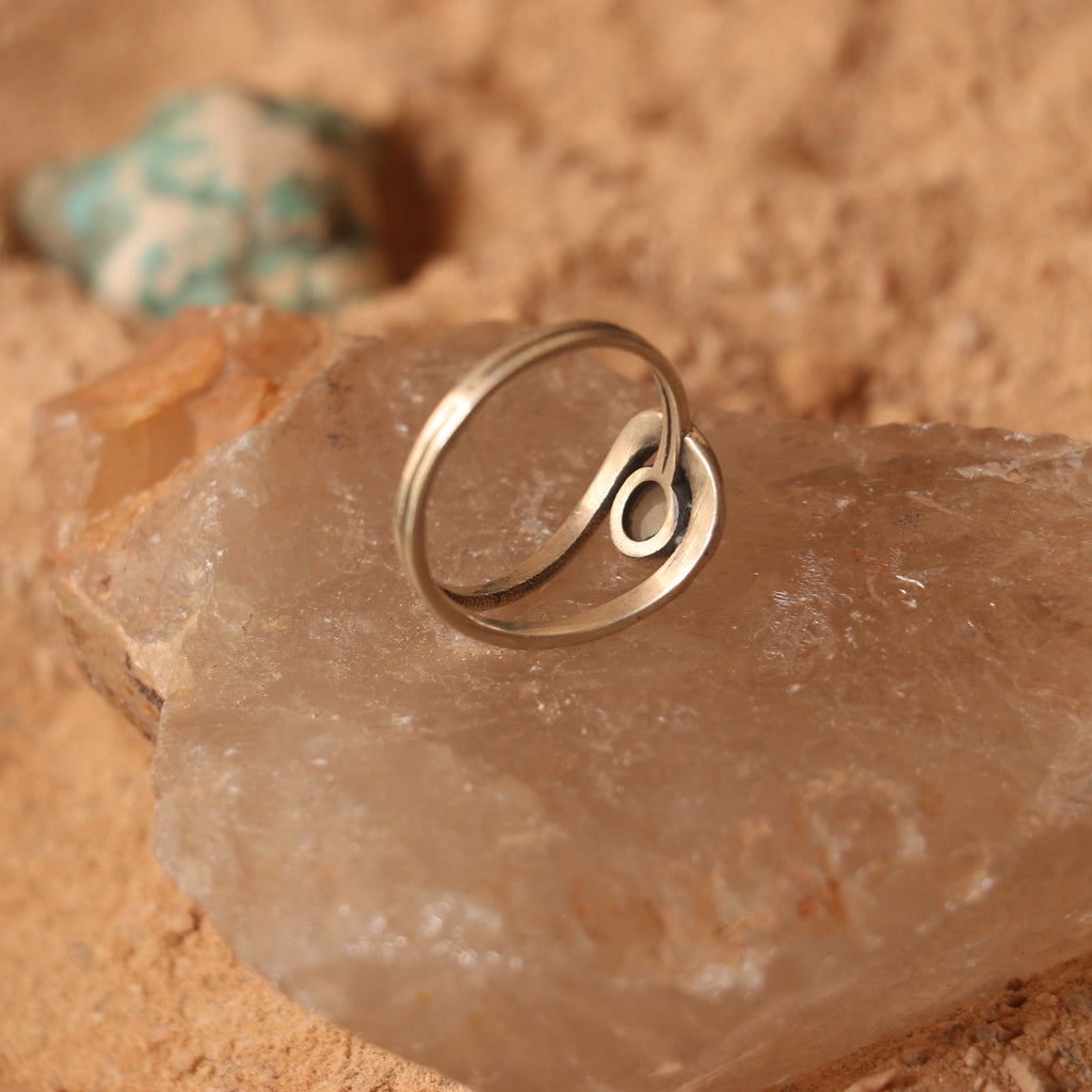 SILVER RING STUDDED WITH ETHIOPIAN OPAL