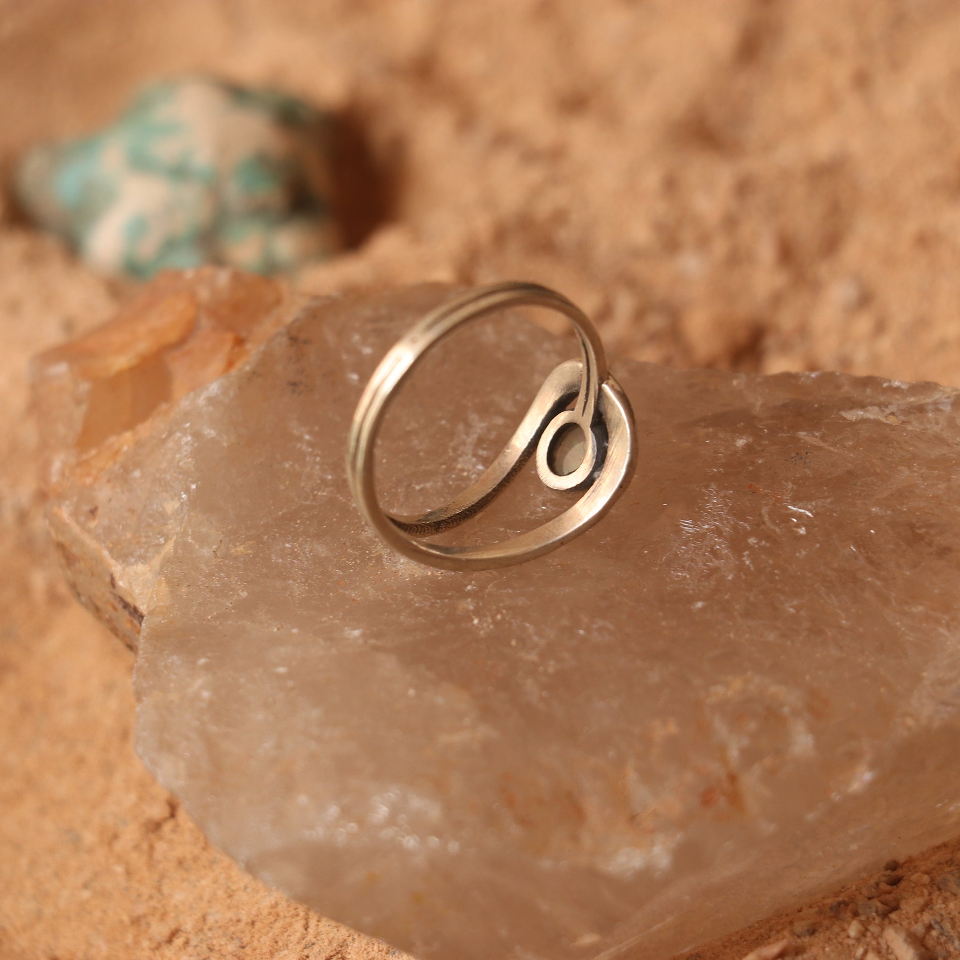 SILVER RING STUDDED WITH ETHIOPIAN OPAL