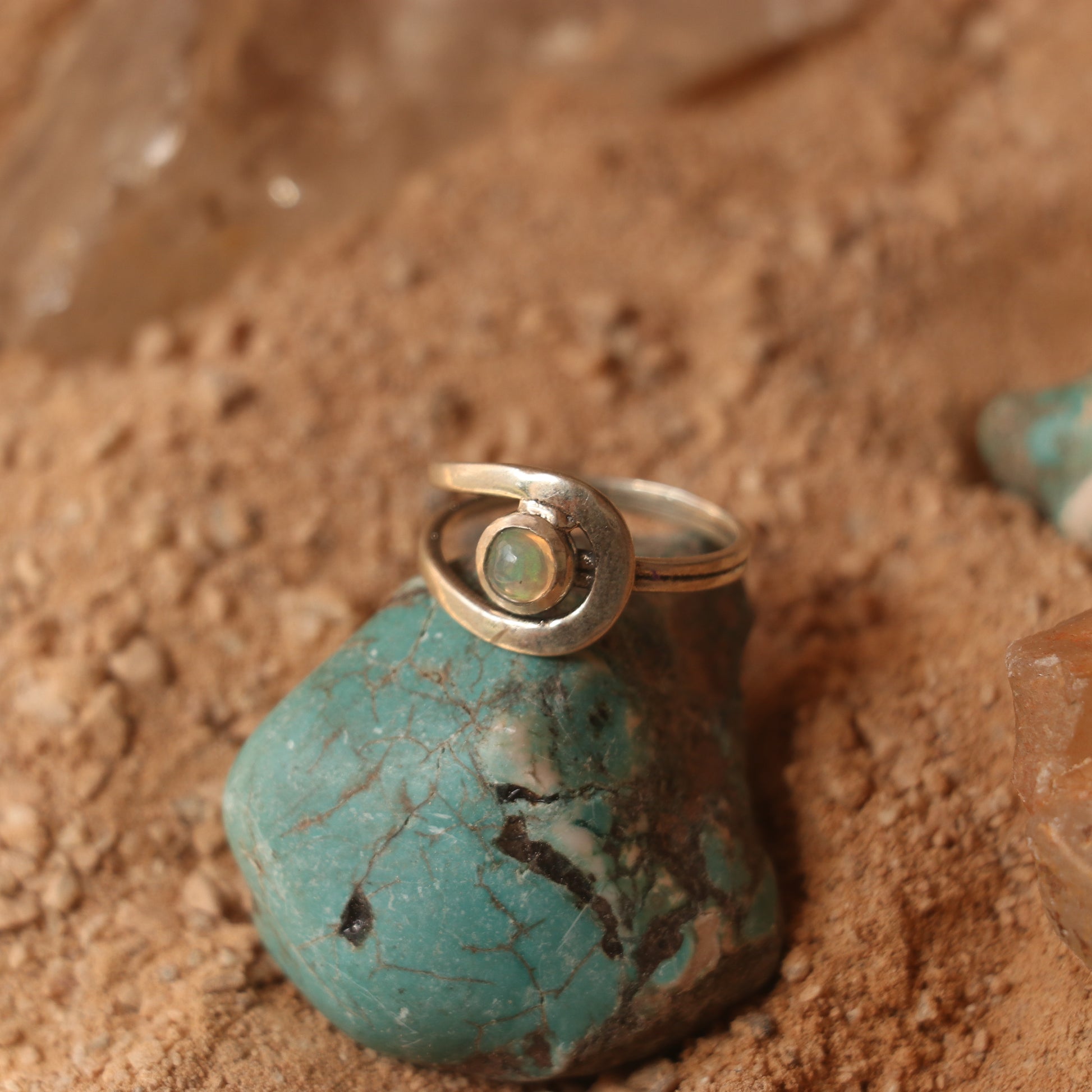 SILVER RING STUDDED WITH ETHIOPIAN OPAL