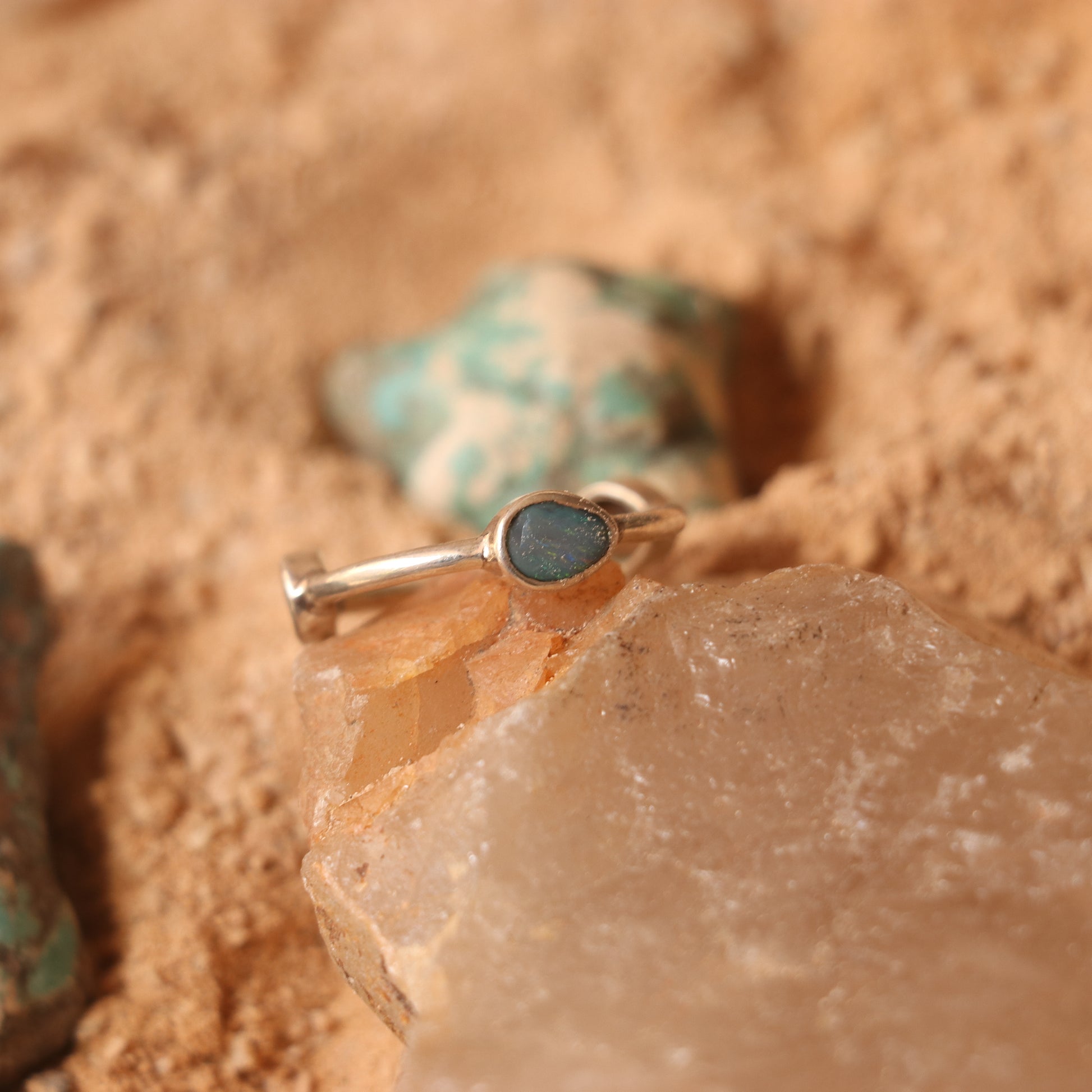 SILVER RING STUDDED WITH AUSTRALIAN BLUE OPAL
