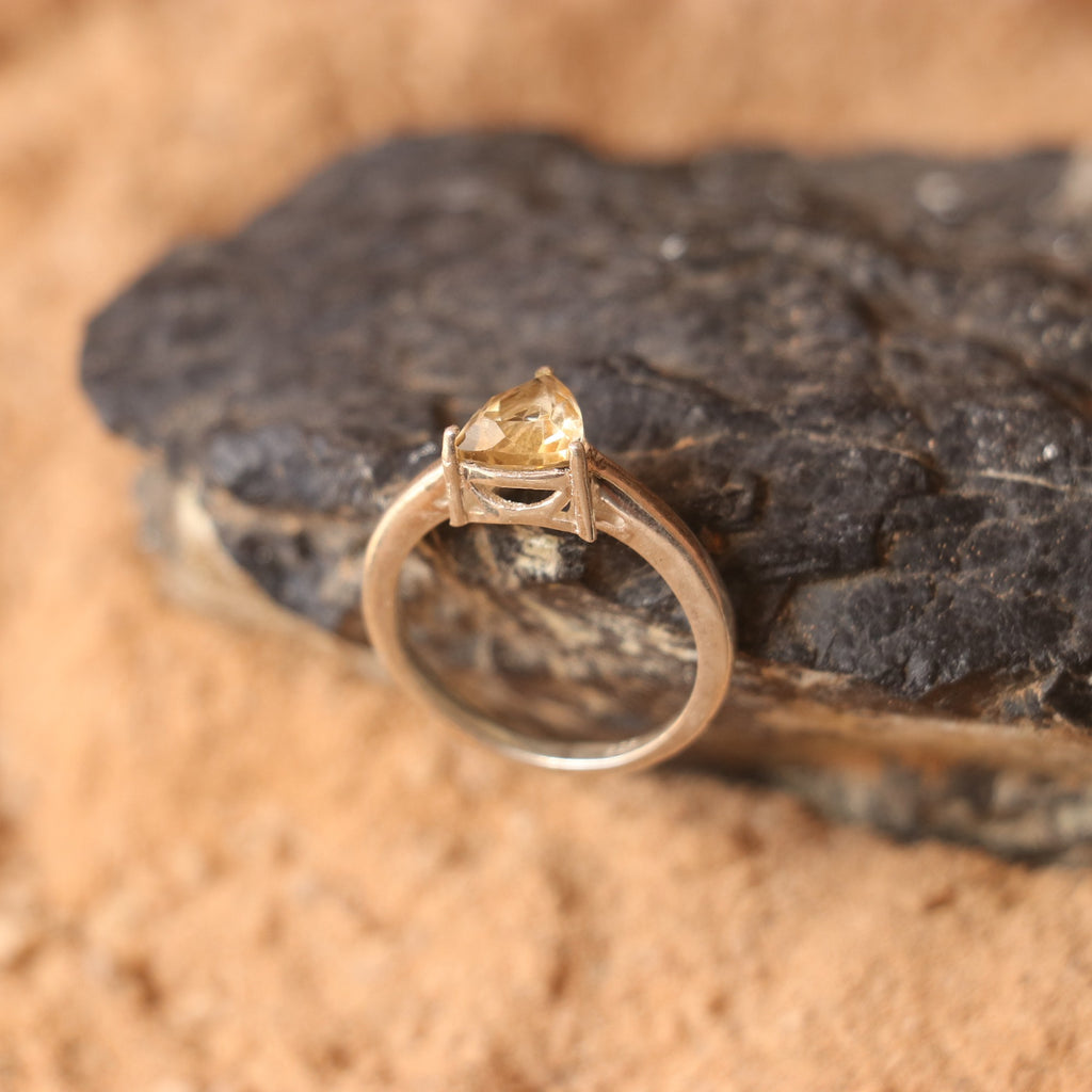 SILVER RING WITH A TRIANGULAR GOLDEN TOPAZ
