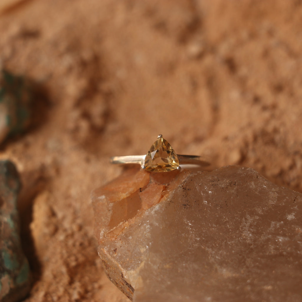 SILVER RING WITH A TRIANGULAR GOLDEN TOPAZ