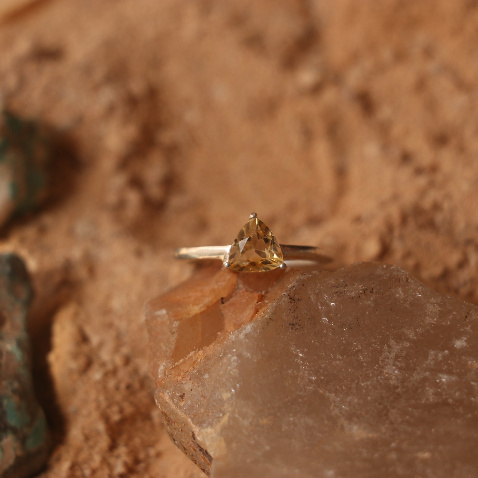 SILVER RING WITH A TRIANGULAR GOLDEN TOPAZ