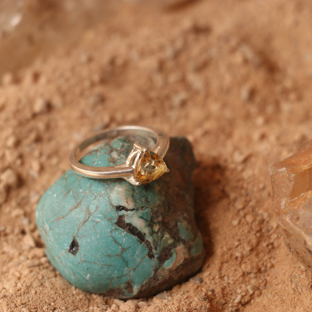 SILVER RING WITH A TRIANGULAR GOLDEN TOPAZ