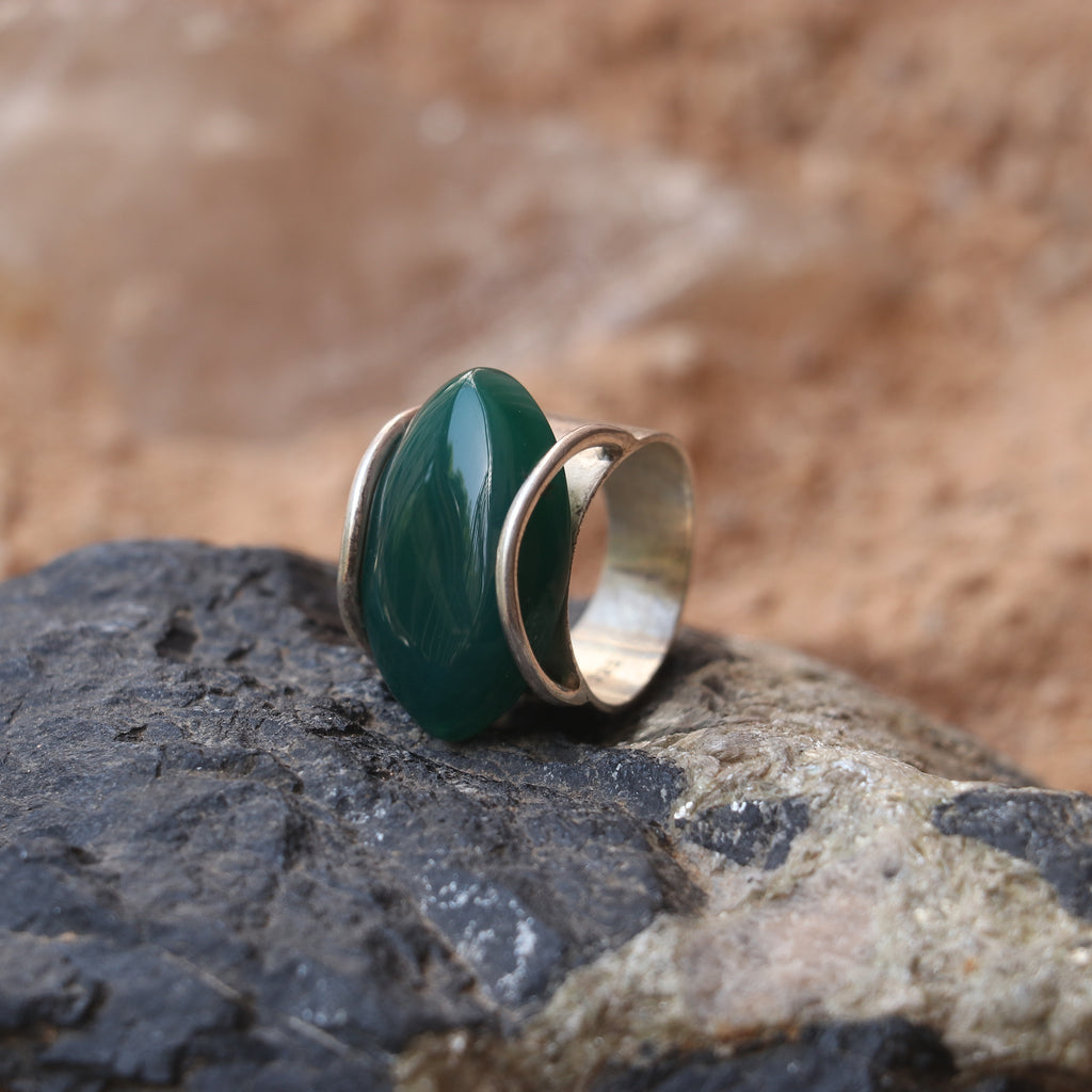 SILVER RING WITH LARGE GREEN ONYX IN A WRAP DESIGN