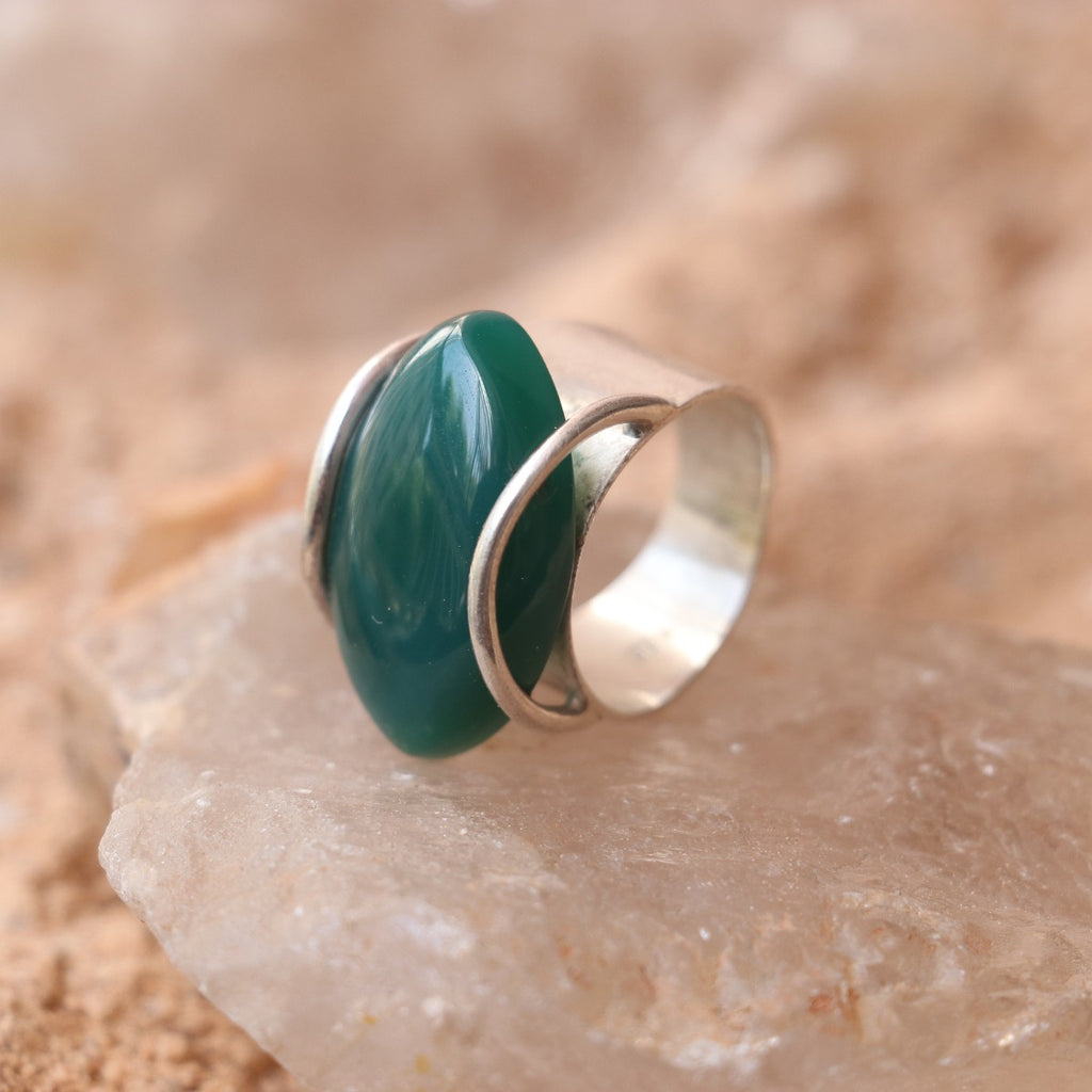 SILVER RING WITH LARGE GREEN ONYX IN A WRAP DESIGN