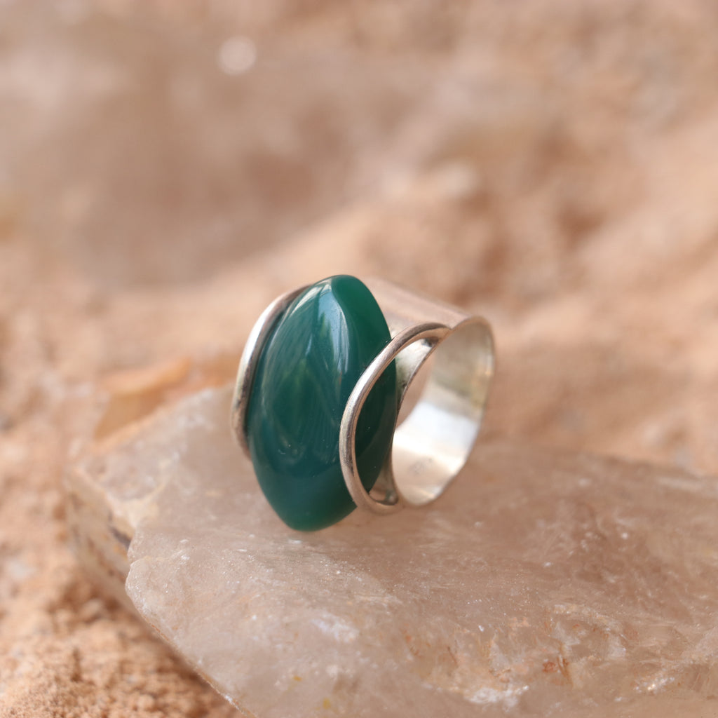 SILVER RING WITH LARGE GREEN ONYX IN A WRAP DESIGN
