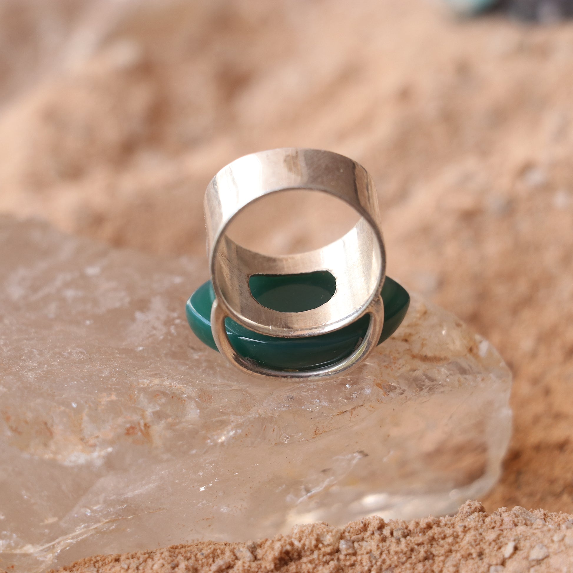 SILVER RING WITH LARGE GREEN ONYX IN A WRAP DESIGN