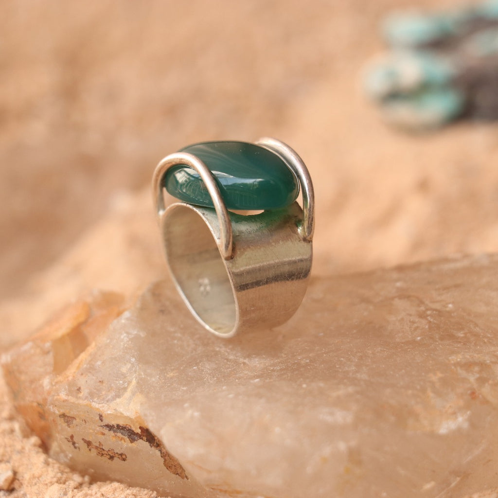 SILVER RING WITH LARGE GREEN ONYX IN A WRAP DESIGN