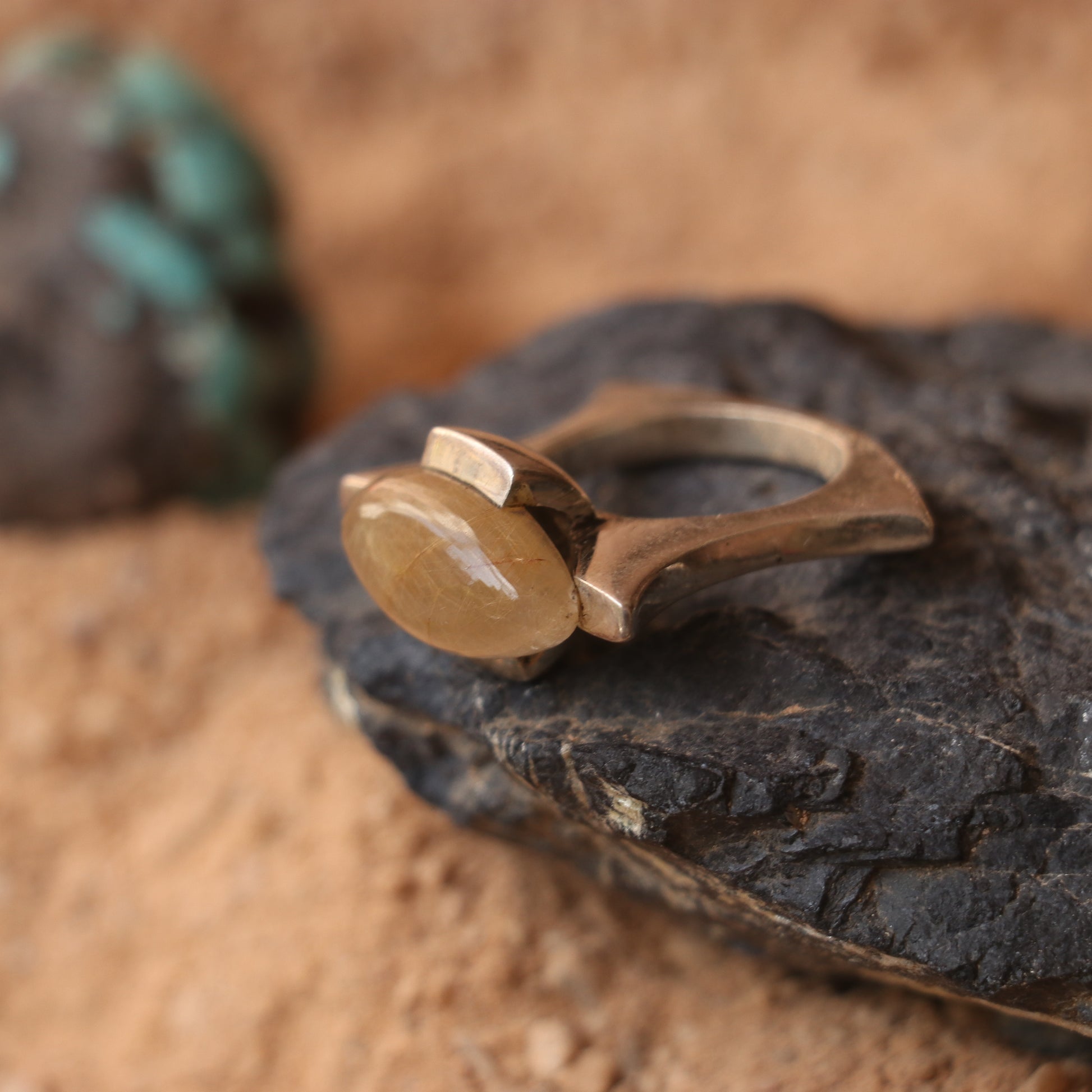 SILVER RING WITH A GOLDEN QUARTZ STONE