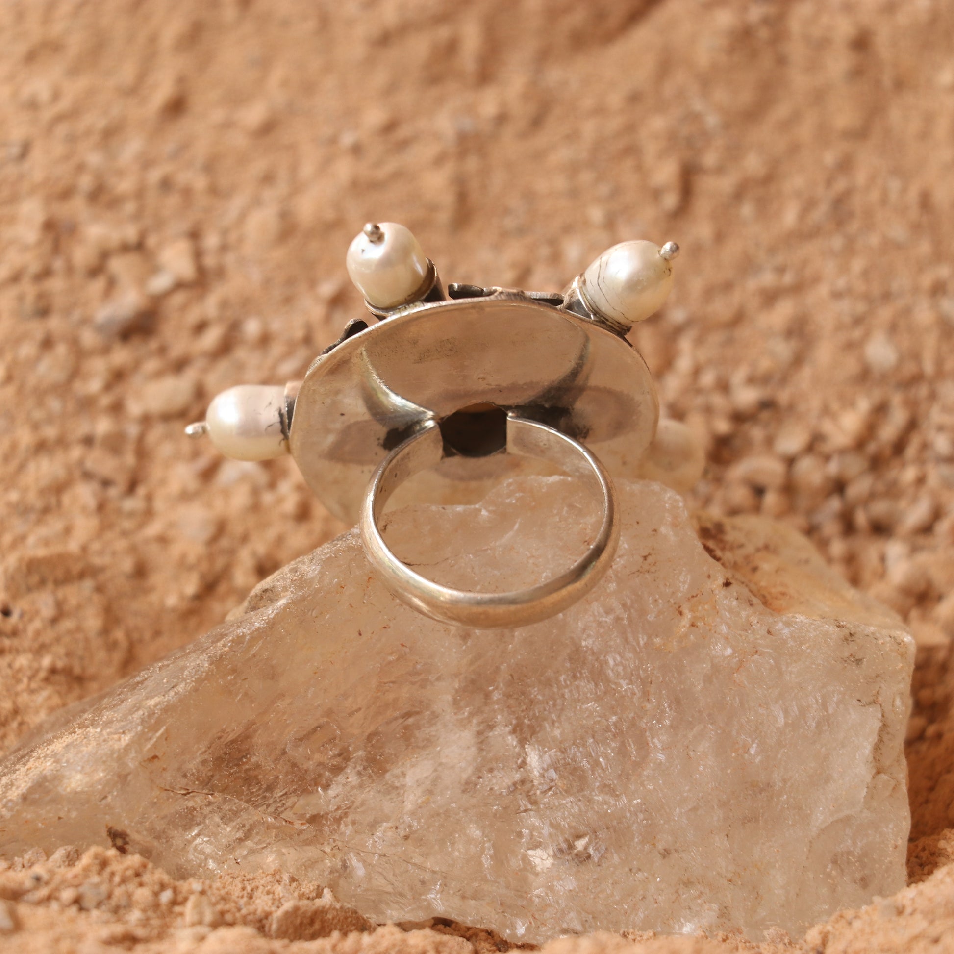 ANTIQUE SILVER RING IN A CIRCULAR DESIGN WITH NATURAL PEARLS