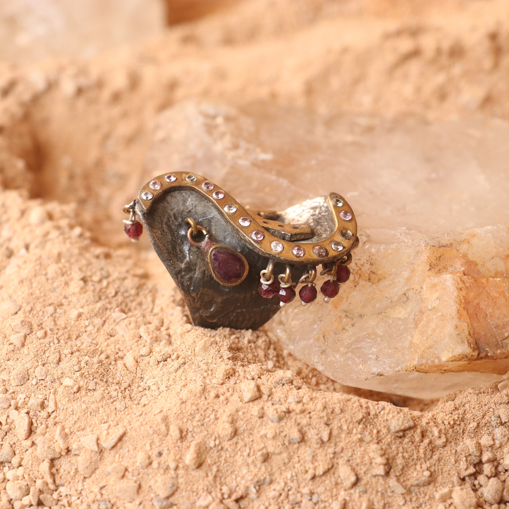 ANTIQUE SILVER RING WITH GOLD DETAILING AND STUDDED WITH RUBIES