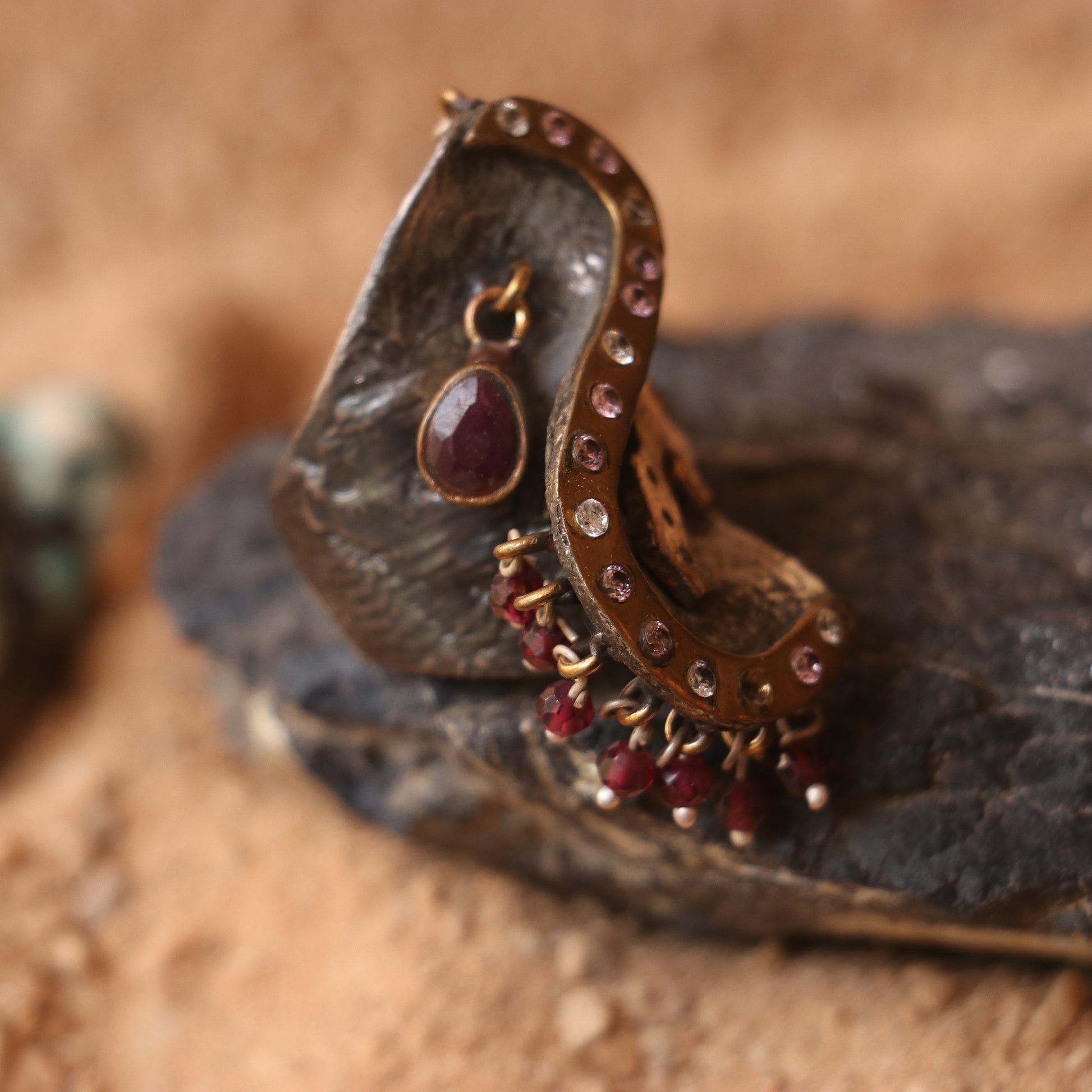 ANTIQUE SILVER RING WITH GOLD DETAILING AND STUDDED WITH RUBIES