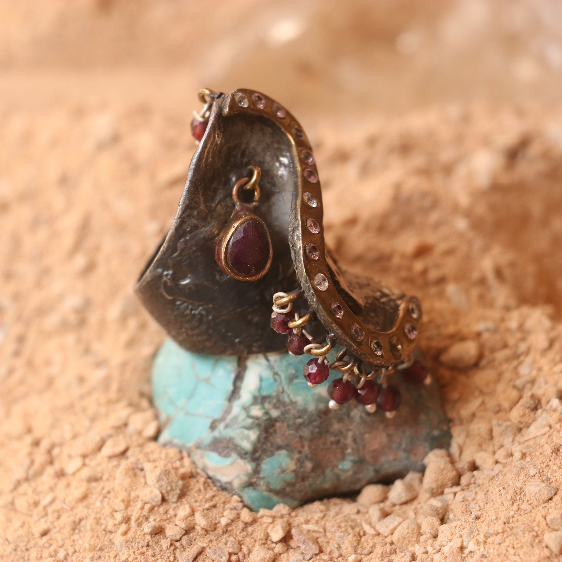 ANTIQUE SILVER RING WITH GOLD DETAILING AND STUDDED WITH RUBIES
