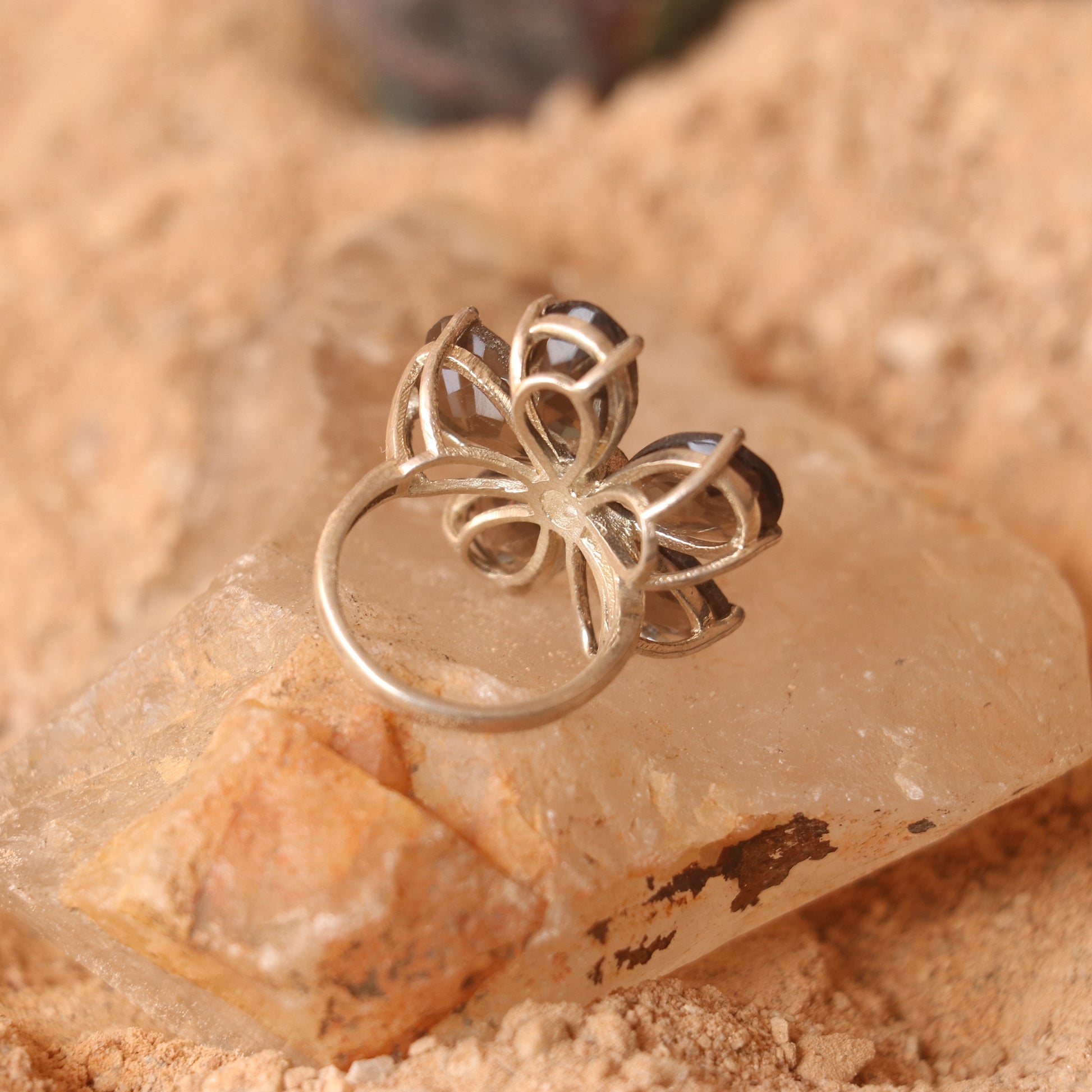SILVER FLOWER RING WITH GOLDEN TOPAZ
