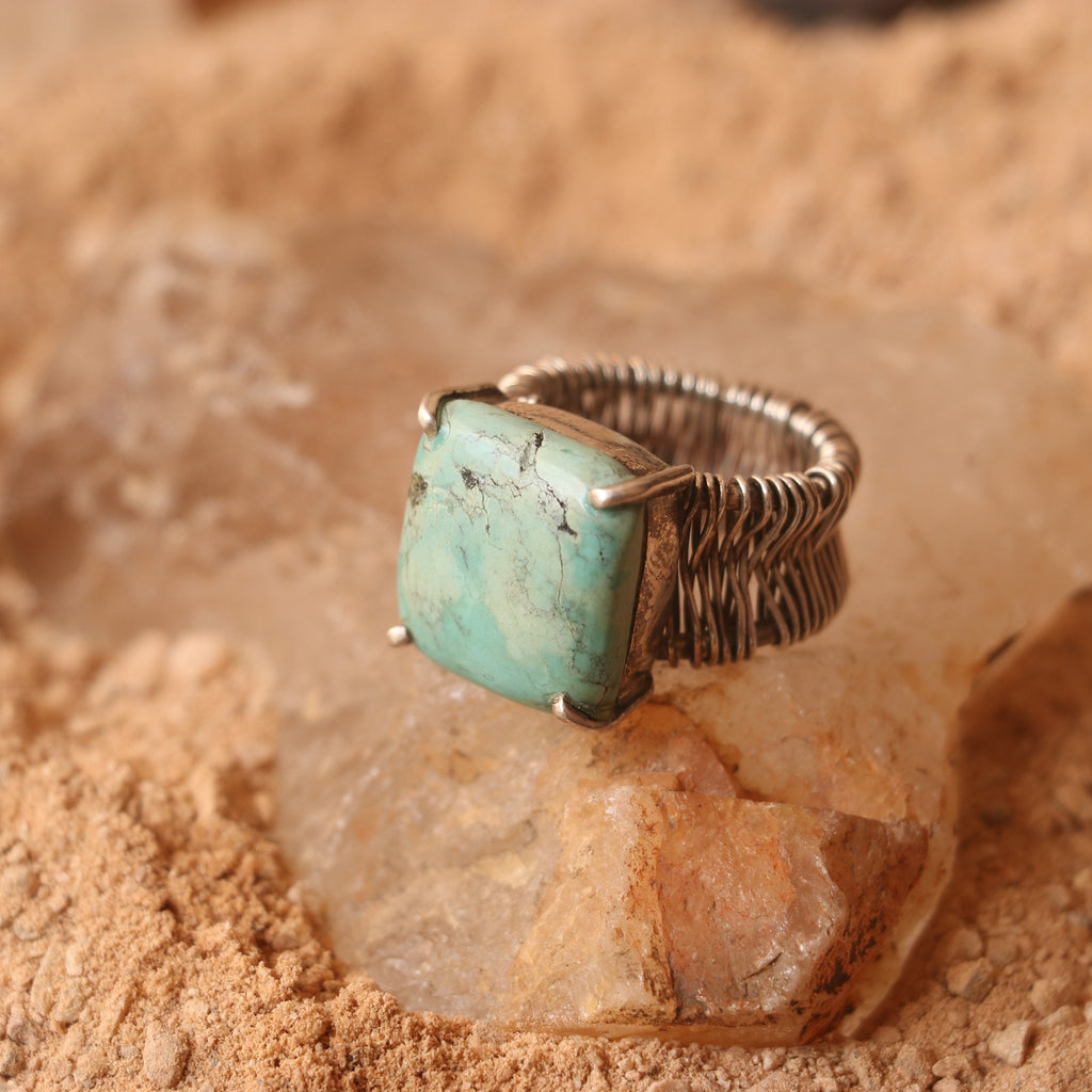 SILVER WIRE WRAPPED RING FEATURING A TURQUOISE