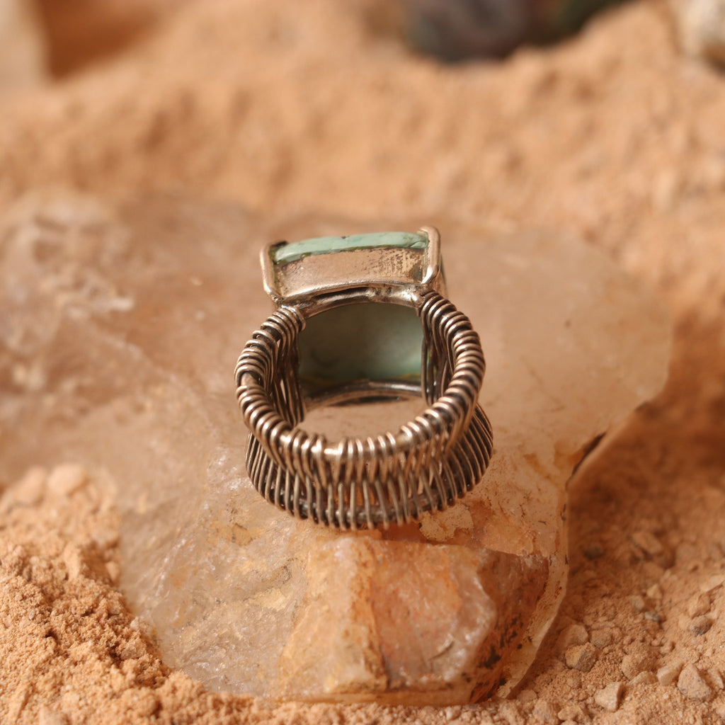 SILVER WIRE WRAPPED RING FEATURING A TURQUOISE