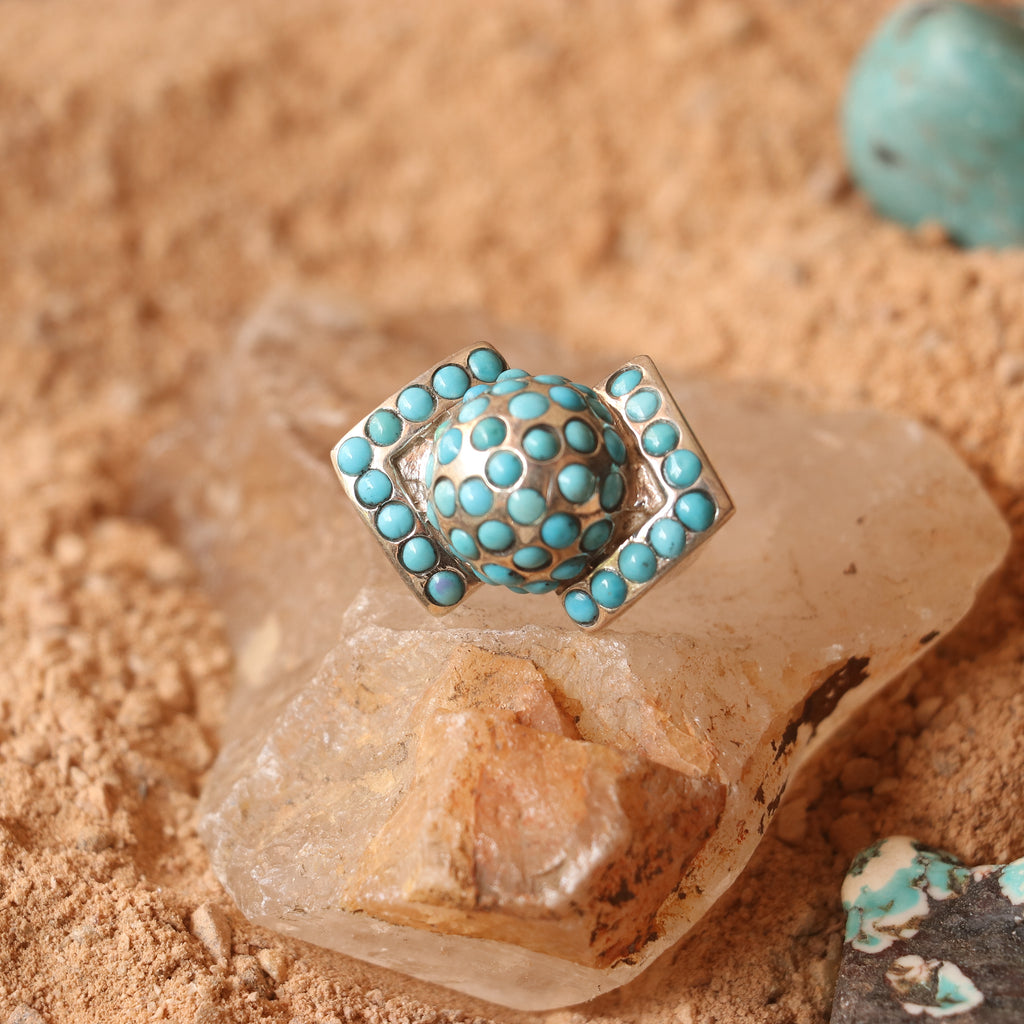 CHUNKY SILVER RING ADORNED WITH TURQUOISES