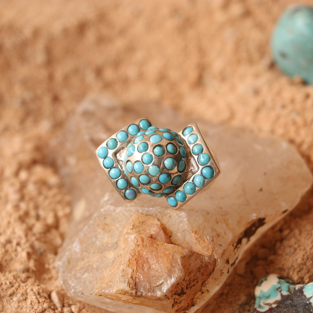 CHUNKY SILVER RING ADORNED WITH TURQUOISES