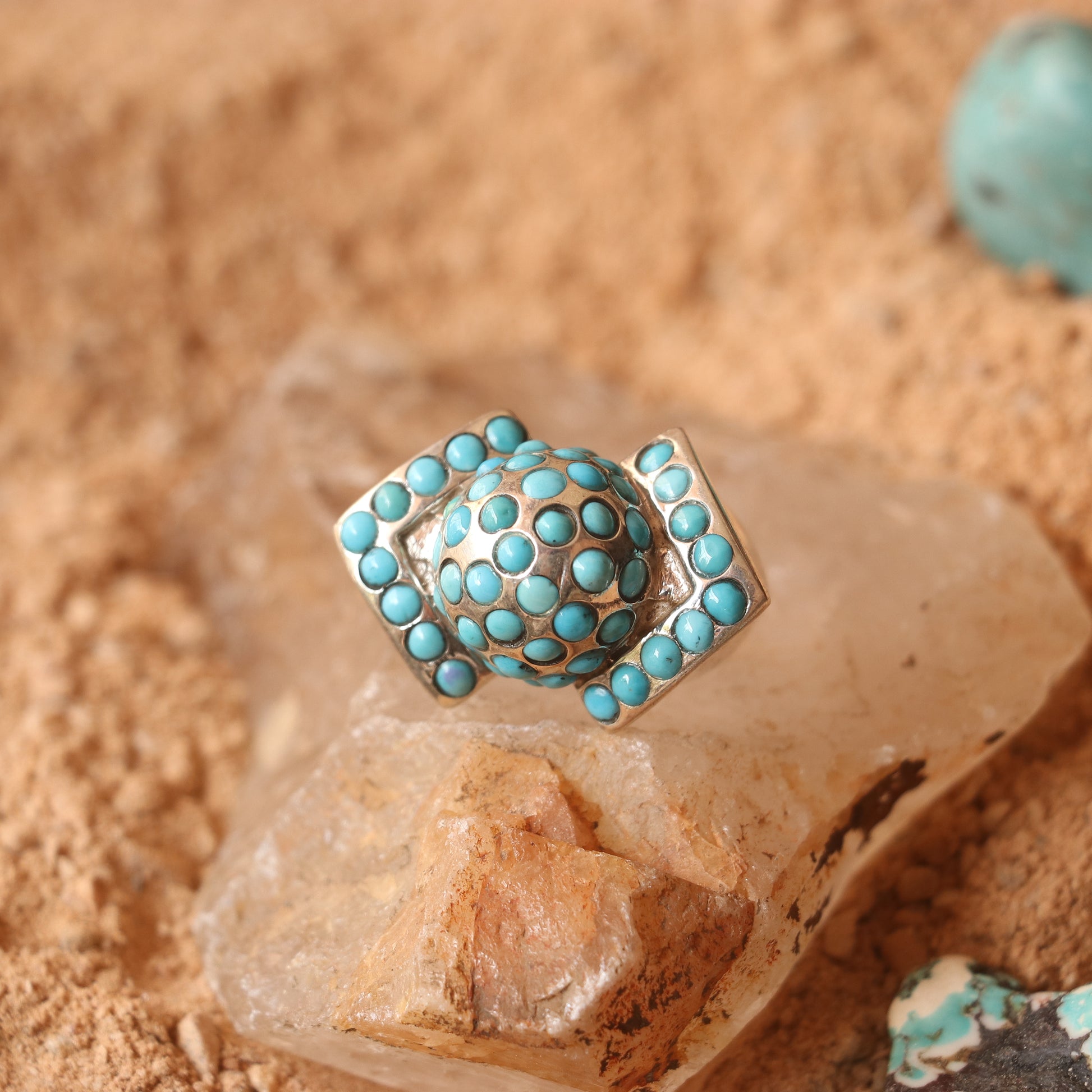 CHUNKY SILVER RING ADORNED WITH TURQUOISES