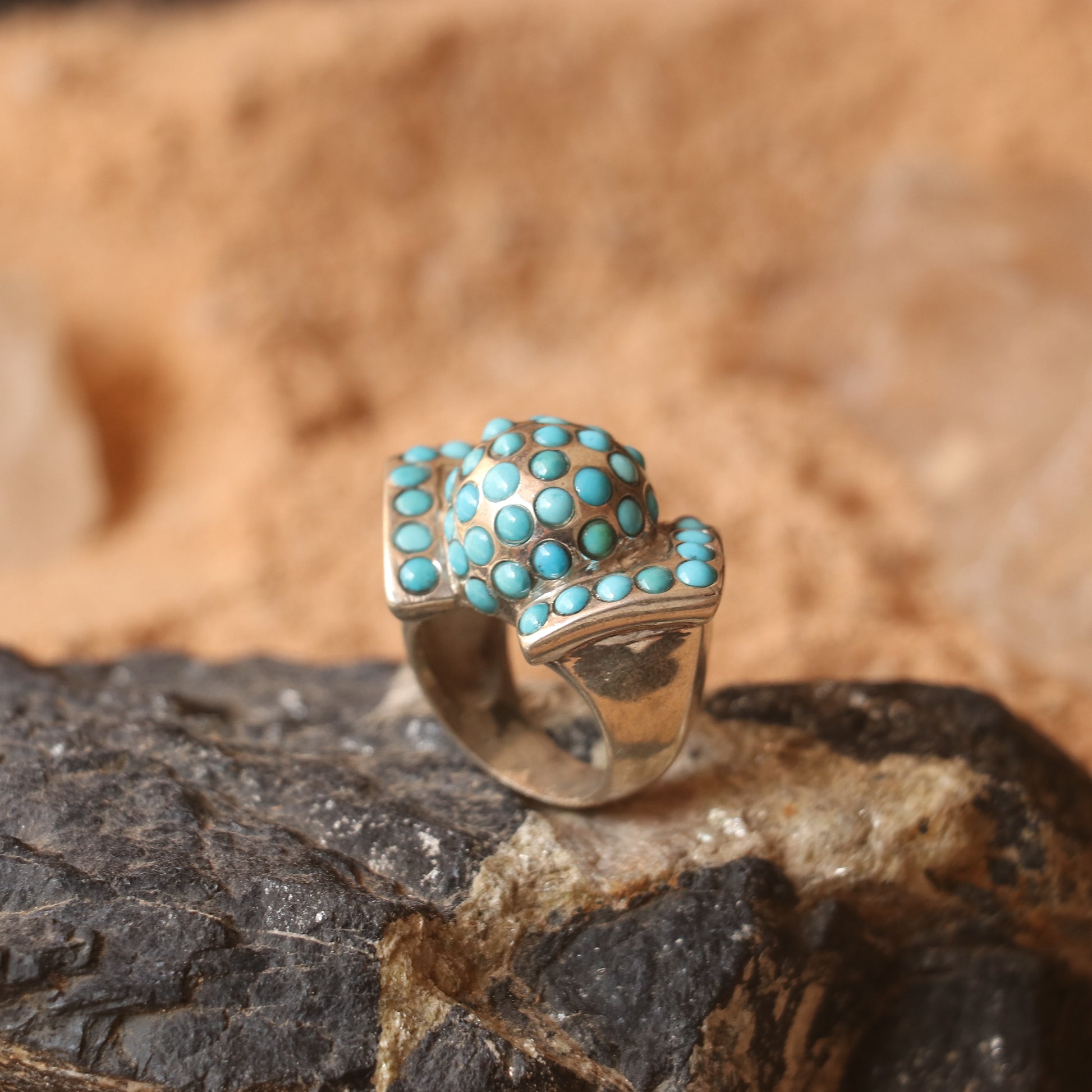 CHUNKY SILVER RING ADORNED WITH TURQUOISES