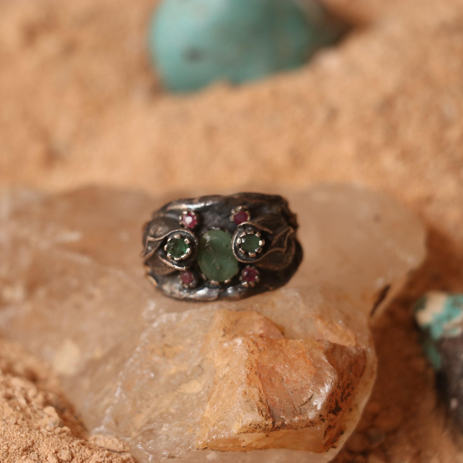 RUSTIC SILVER RING FEATURING RUBIES & EMERALDS