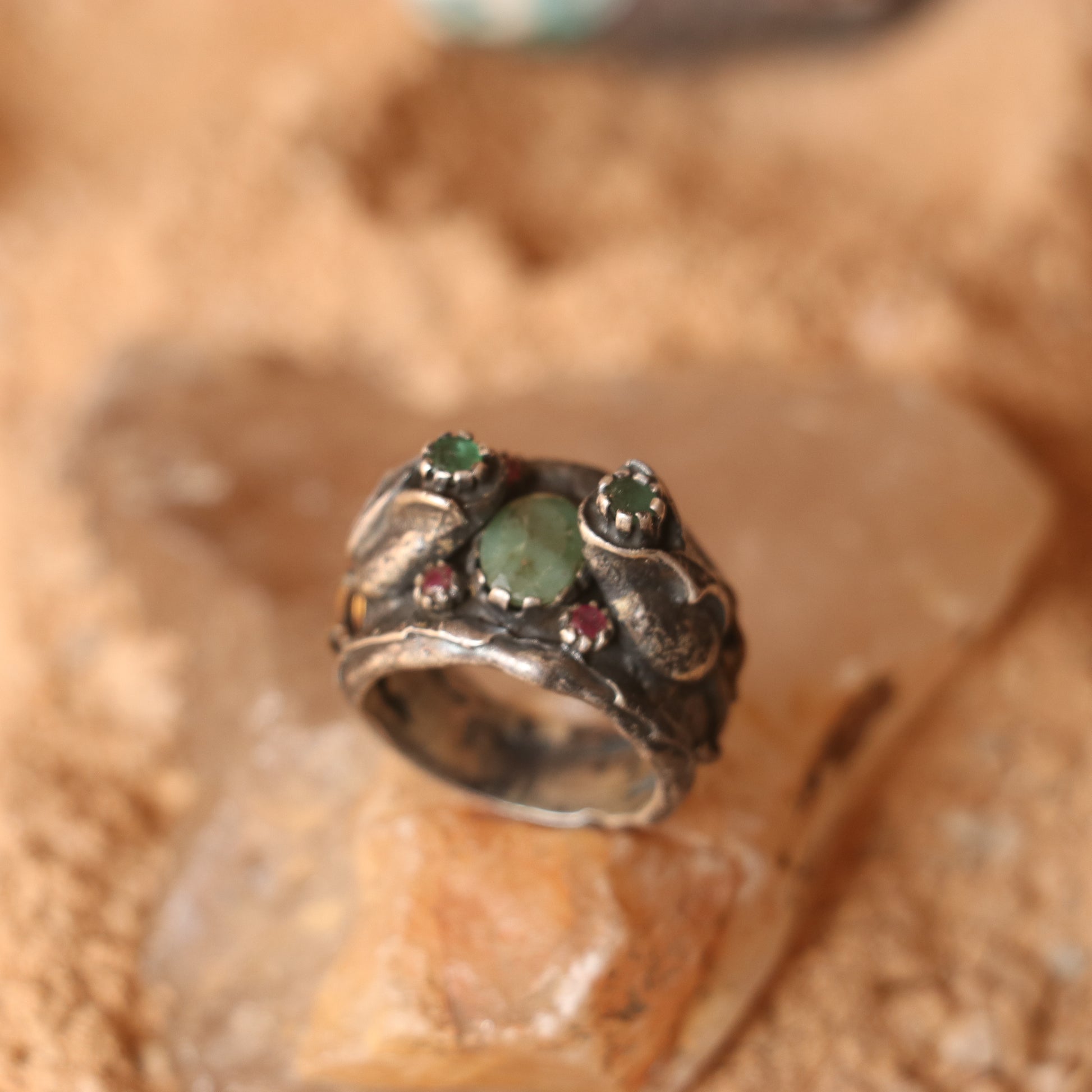 RUSTIC SILVER RING FEATURING RUBIES & EMERALDS