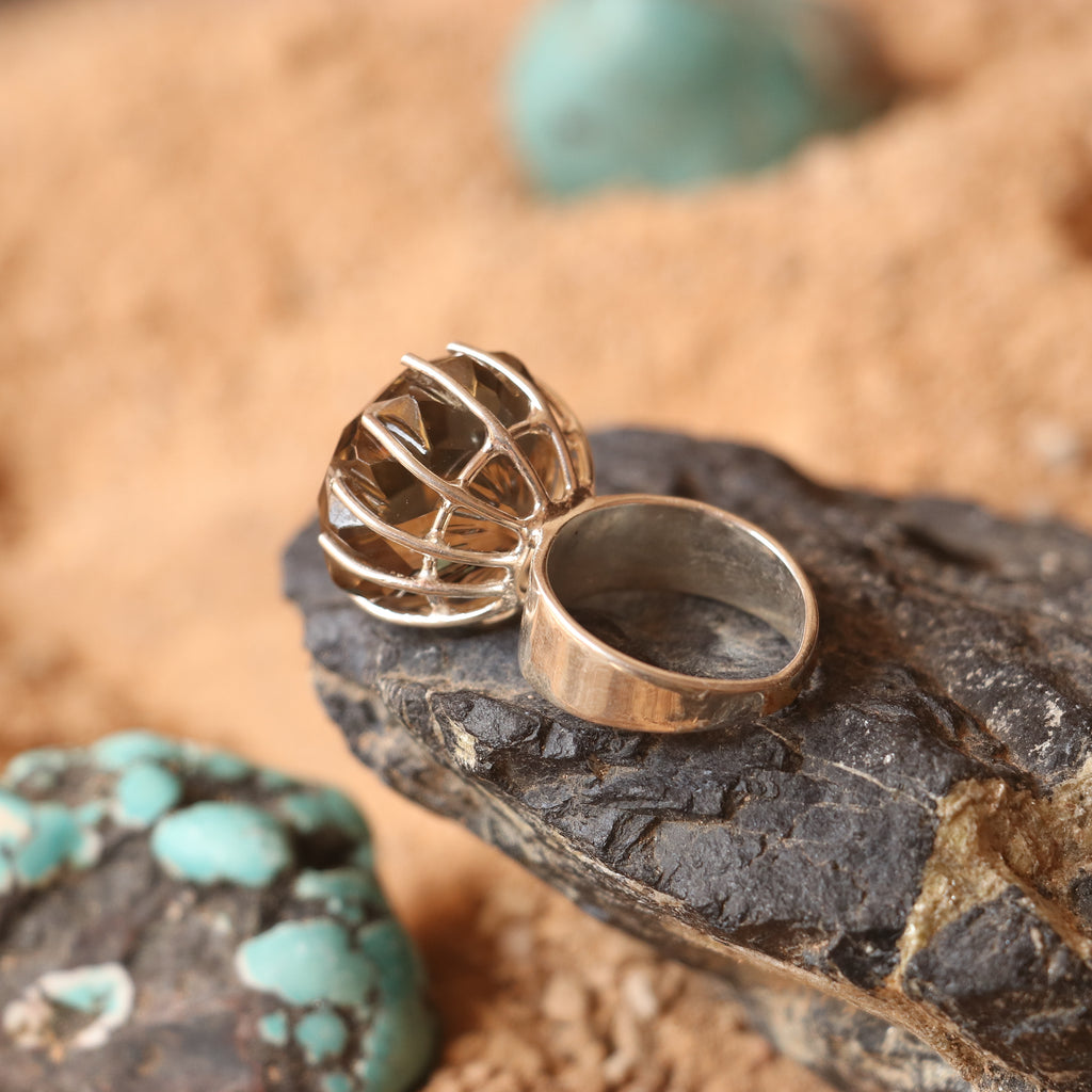 SILVER RING FEATURING A LARGE GOLDEN TOPAZ