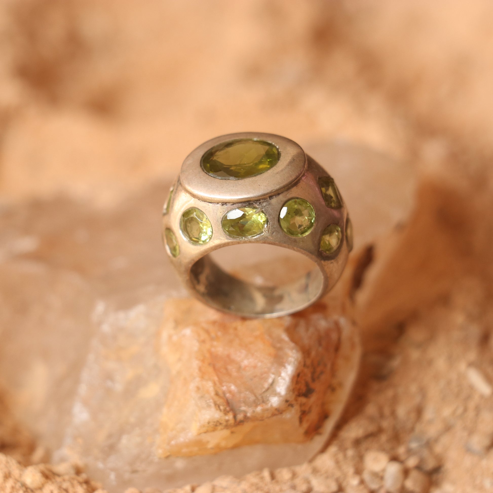 SILVER RING FEATURING MULTIPLE PERIDOTS