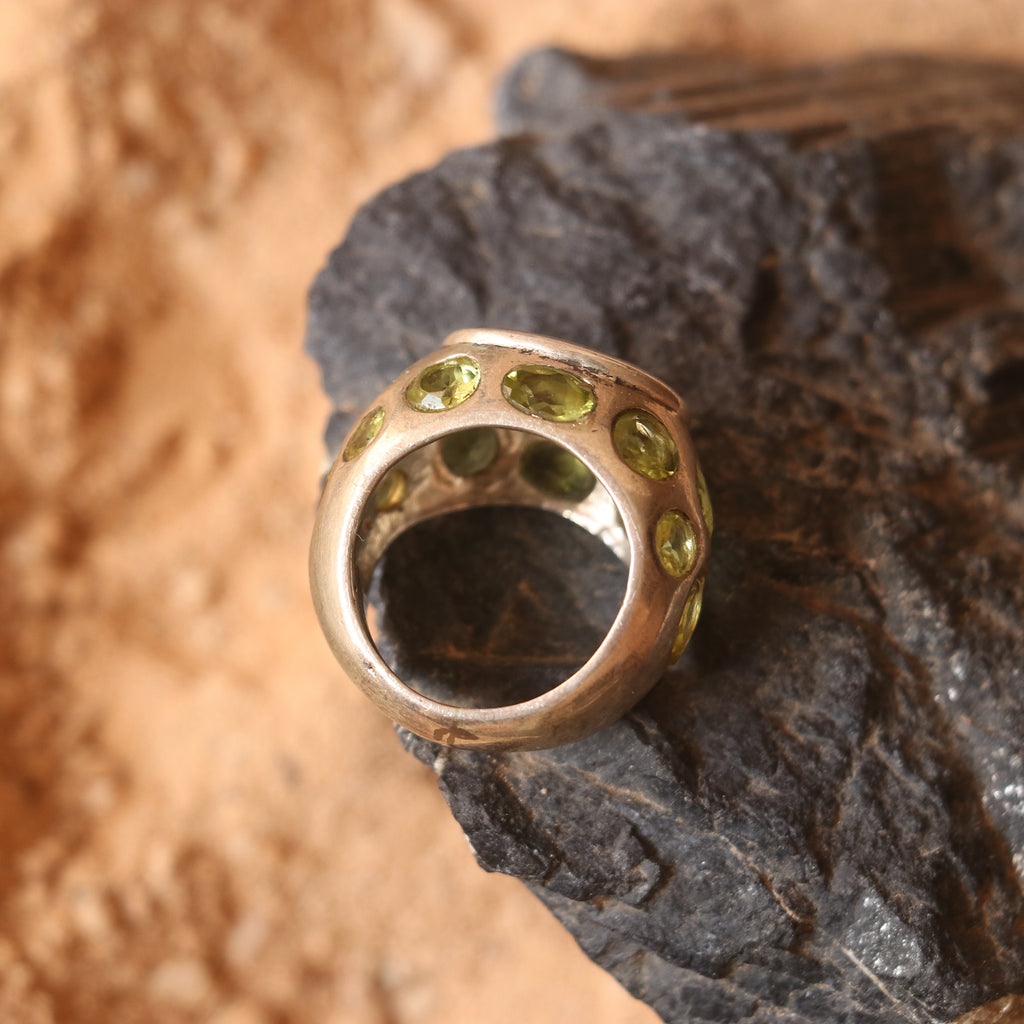 SILVER RING FEATURING MULTIPLE PERIDOTS