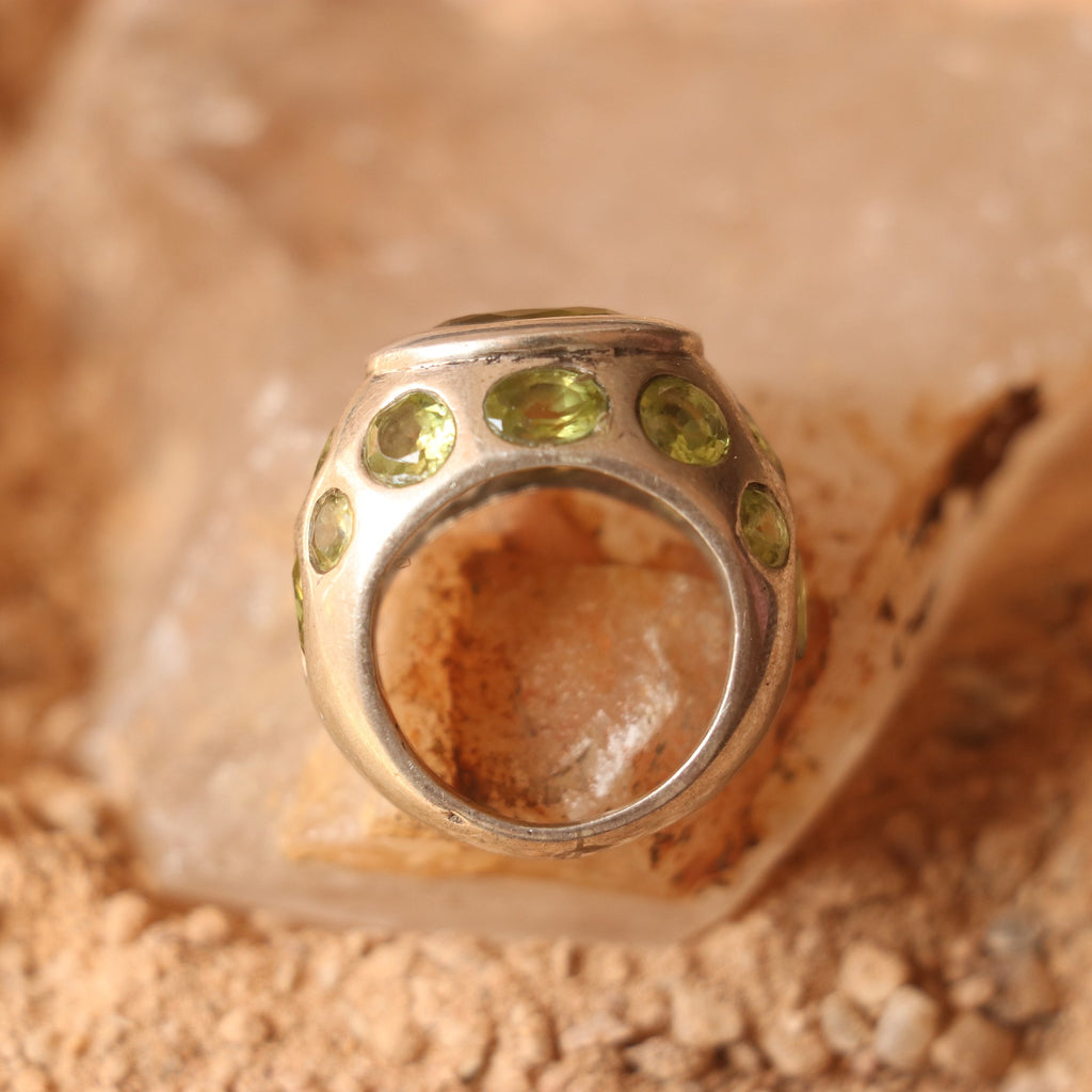 SILVER RING FEATURING MULTIPLE PERIDOTS