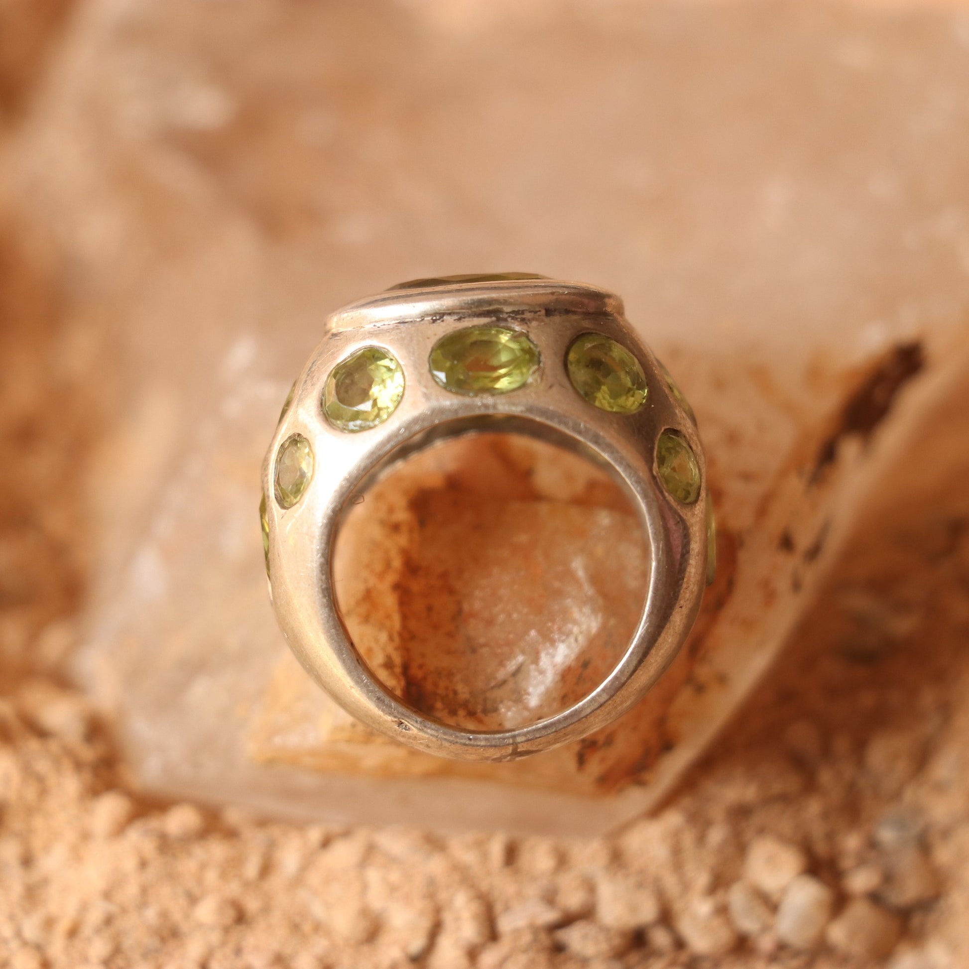 SILVER RING FEATURING MULTIPLE PERIDOTS