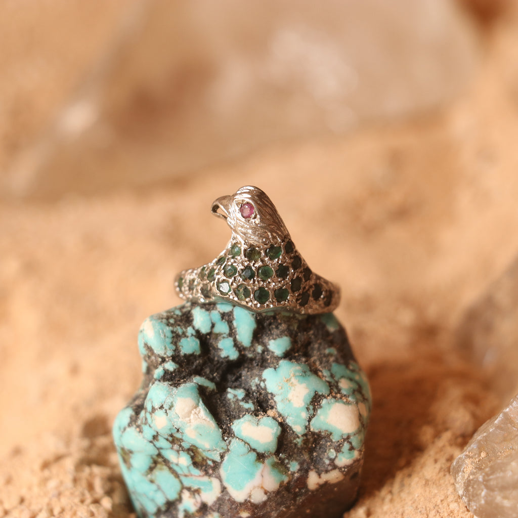 SILVER EAGLE SHAPED RING WITH EMERALDS & A SMALL RUBY EYE