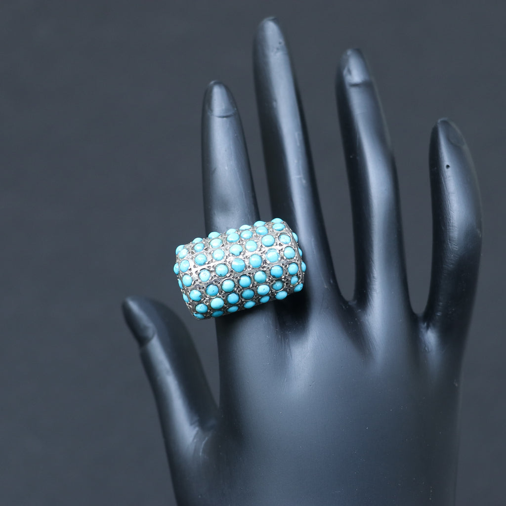 SILVER RING SET IN SMALL TURQUOISES