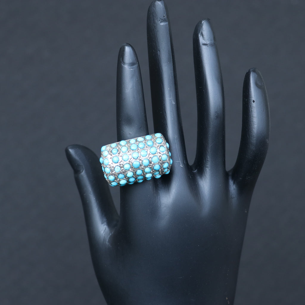 SILVER RING SET IN SMALL TURQUOISES